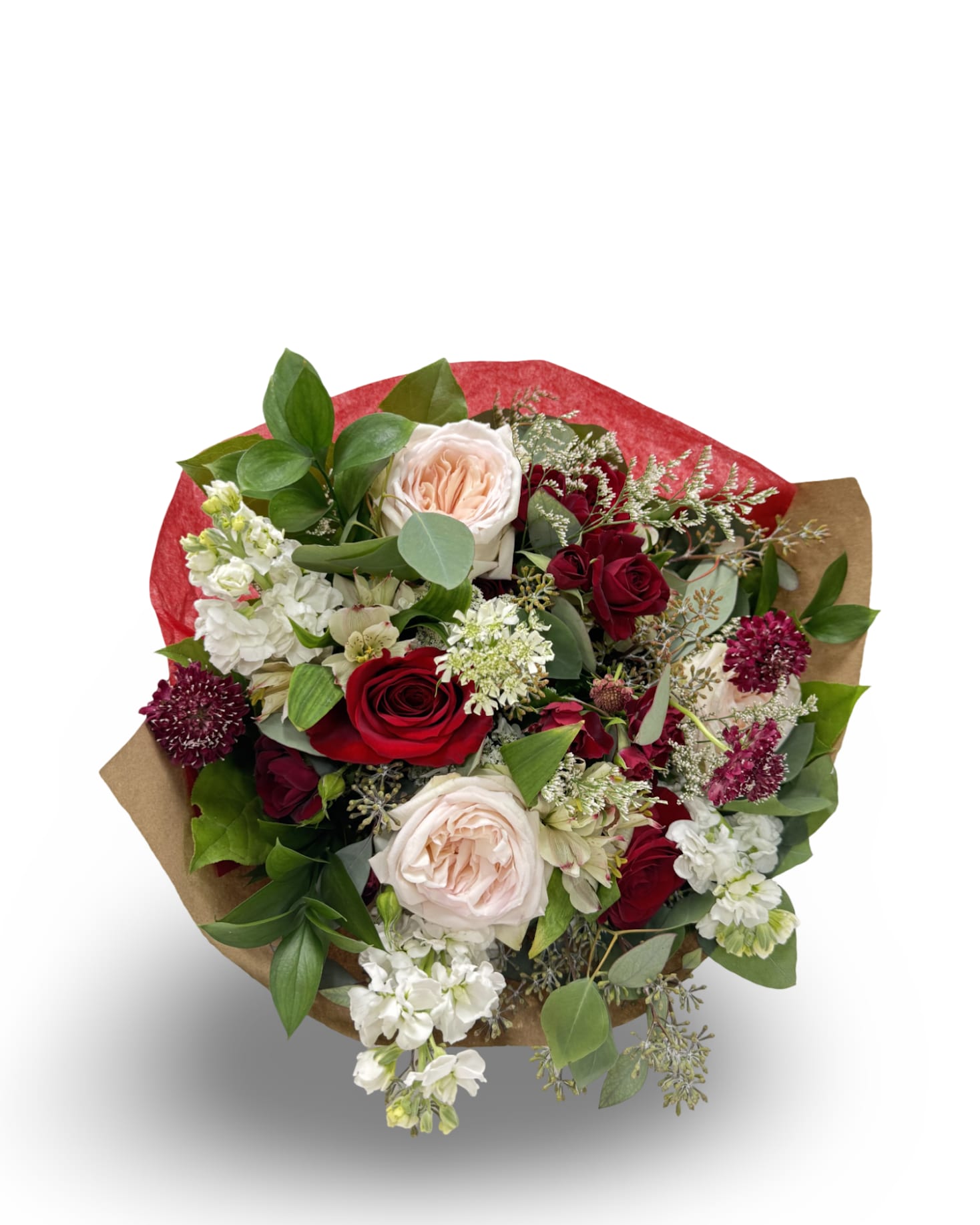Sugar and Rose Cello Sugar and Rose Cello - Romantic and gift ready, Sugar and Rose features soft light pink roses, deep red roses, and delicate raspberry scabiosa. White stock, airy orlaya, and fresh white alstroemeria add brightness and texture to this lush mix. Wrapped in brown paper with red tissue accents and finished with a bow, it arrives in a fresh wet sponge for lasting beauty and is perfect for giving without the need for a vase.