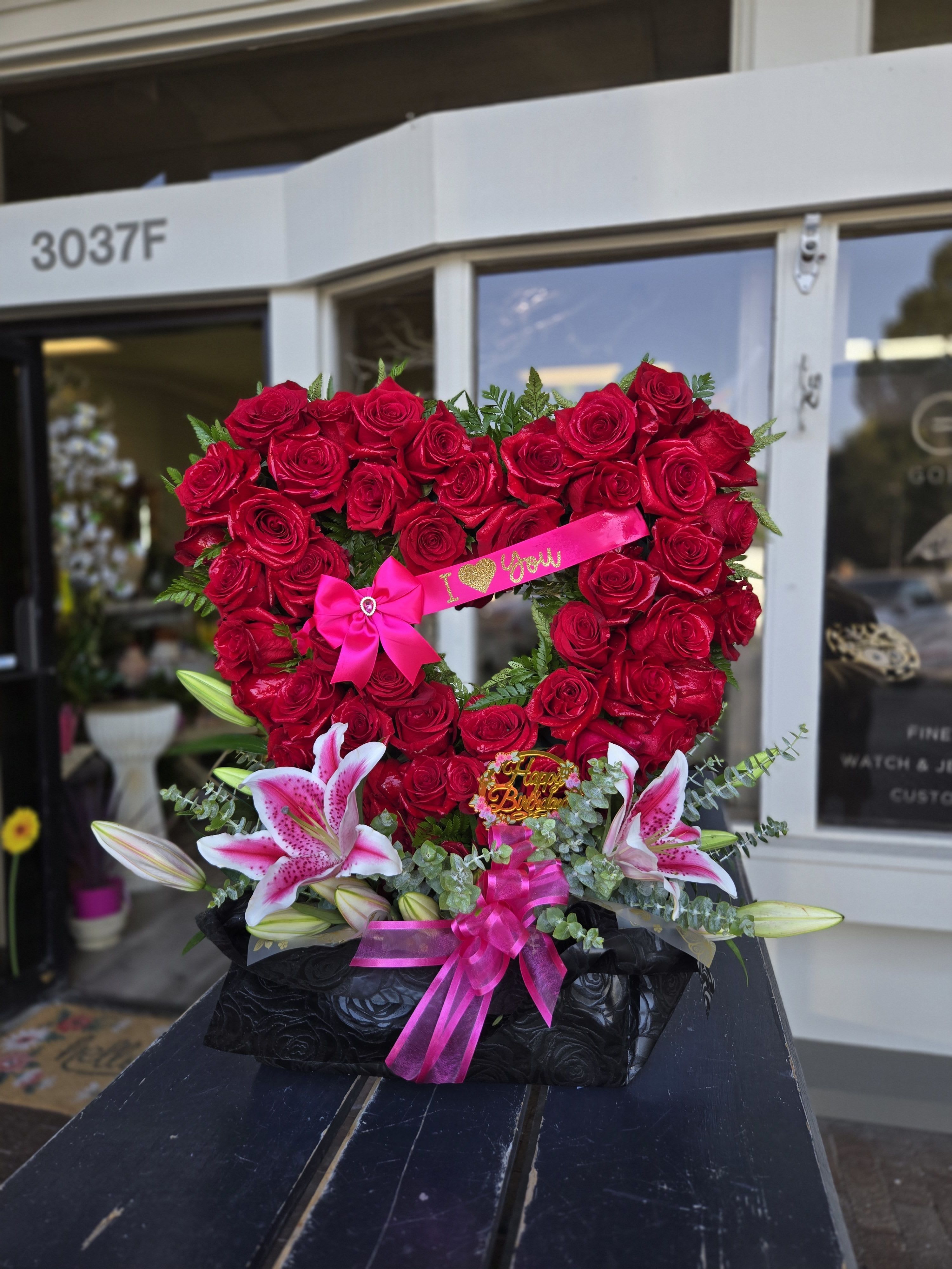 Corazon Arrangement -Table top  - For any occasion a beautiful open heart designed with lush roses in a custom made wood box. You want a WOW factor this is it.     