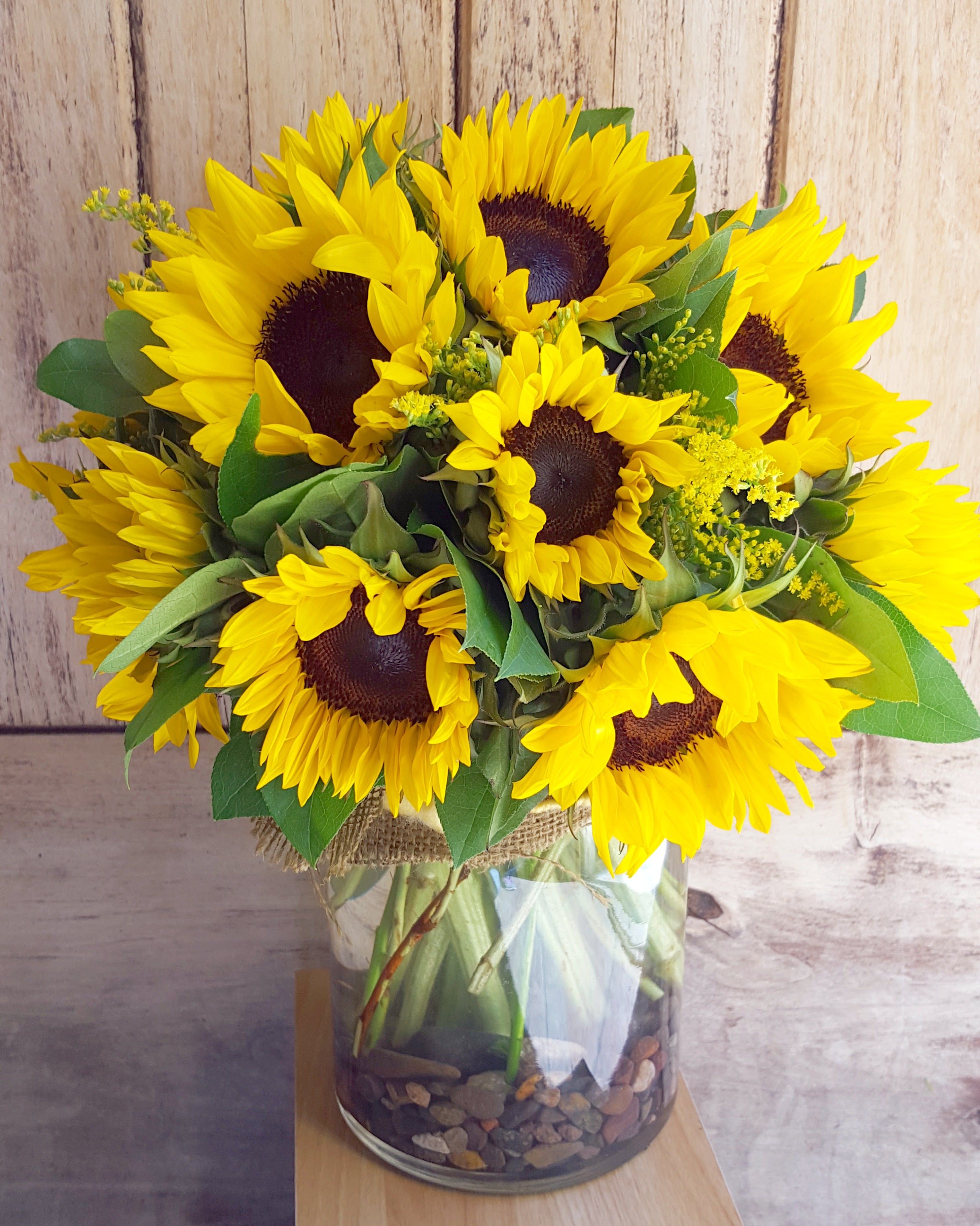 Bright Sunflowers Bright Sunflowers - All round arrangement of sunflowers in a rounded compact design. Sunflower colors may vary depending on availability. A great happy and joyous arrangement to brighten anyone’s day.