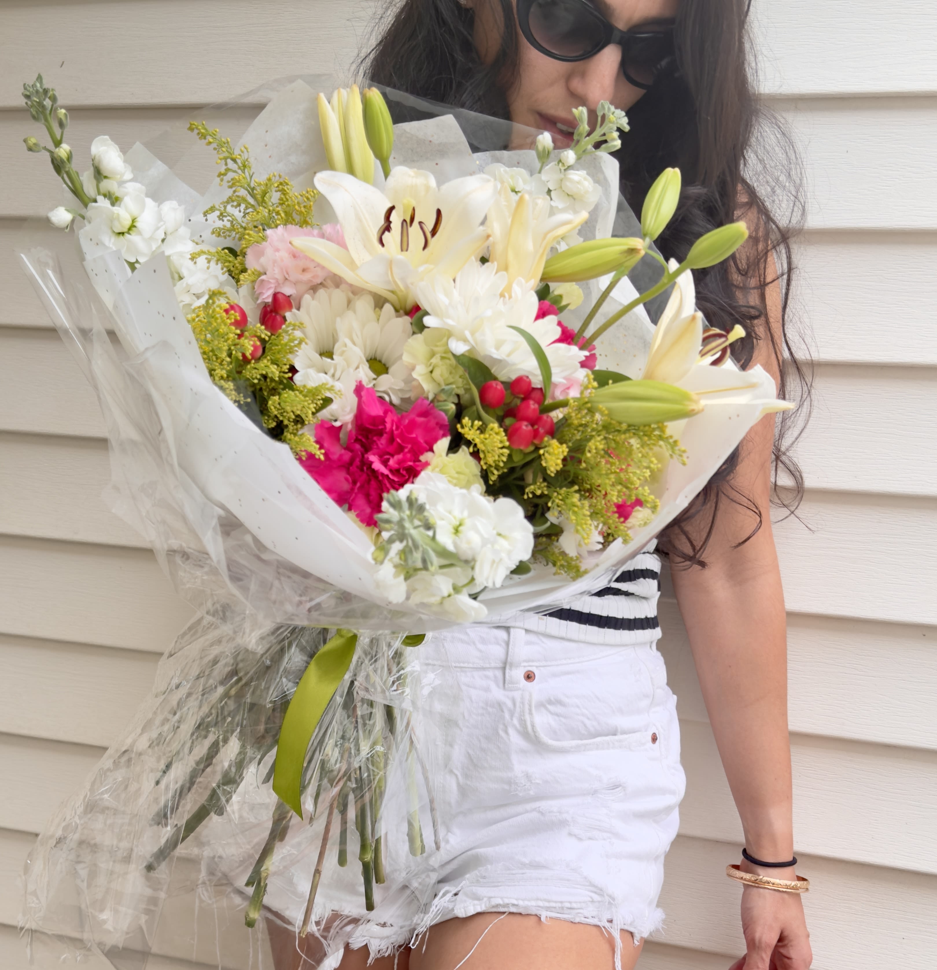 Lielle's Bouquet - Fresh hand-tied Bouquet.features beautiful flowers that are each hanpickd with the client in mind. best gift to bring for a birthday,anniversary,graduation and any special occasion you might have. Arrangement includes -Fresh flowers -Wrapping papers -Greeting card