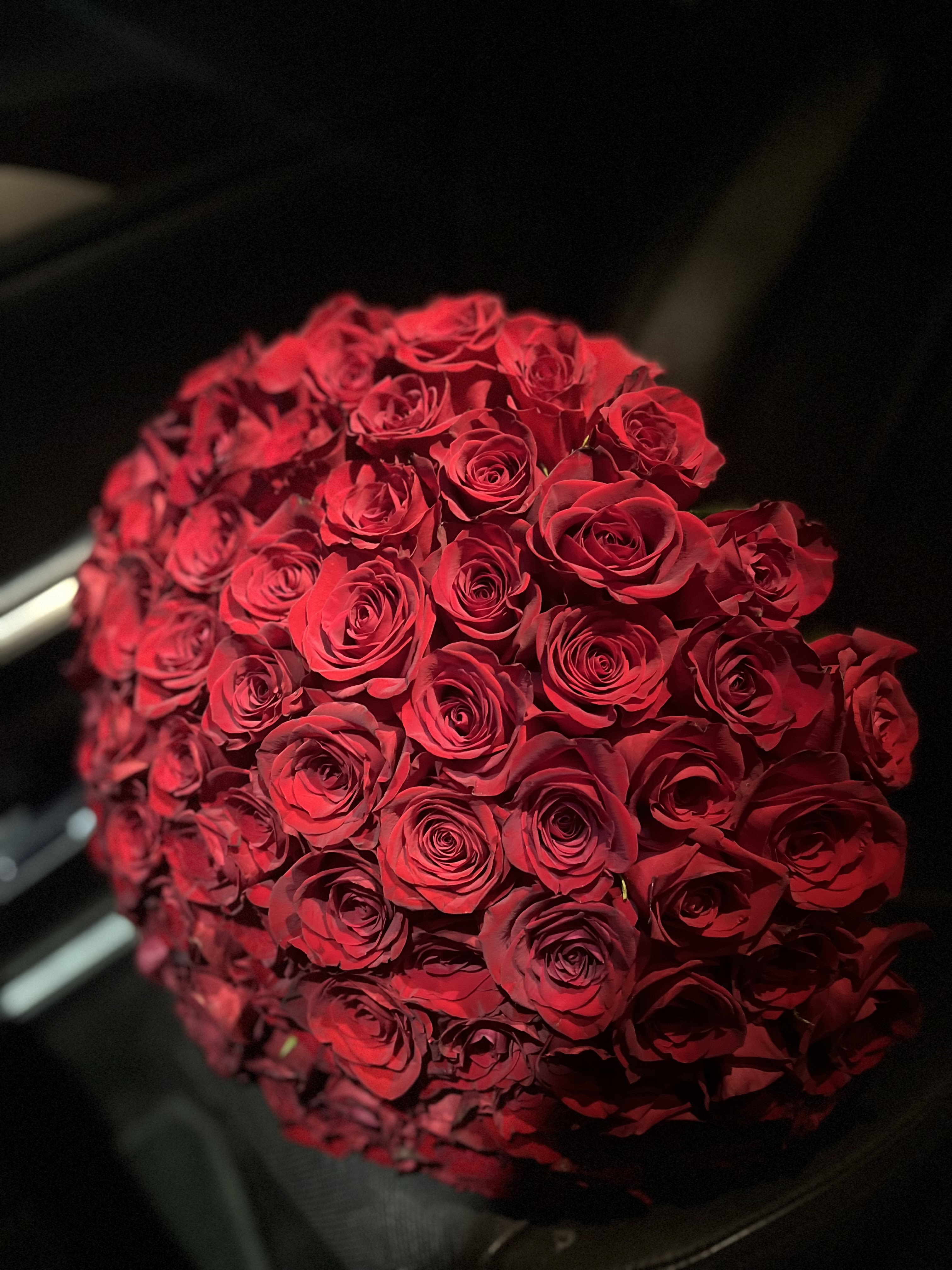 Bouquet of 50 red roses for your loved one Bouquet of 50 red roses for your loved one - When words aren’t enough, let 50 radiant red roses speak the language of love. Each rose in this luxurious arrangement is handpicked for its flawless bloom and deep crimson hue — the ultimate symbol of passion, devotion, and timeless romance. Whether it’s an anniversary, a proposal, a milestone celebration, or just a spontaneous gesture to remind your beloved how much they mean to you, this bouquet makes a statement that lingers in the heart long after the flowers are delivered. Wrapped with elegance and care, our 50 red roses come tied with satin ribbon and presented in exquisite packaging that enhances their natural beauty. Every petal whispers, ‘I love you,’ while fifty blooms together create a breathtaking display of affection and admiration. Surprise the love of your life with a gift they’ll never forget — because true love deserves nothing less than extraordinary. Let this bouquet become a memory, a promise, and a symbol of your deepest feelings.