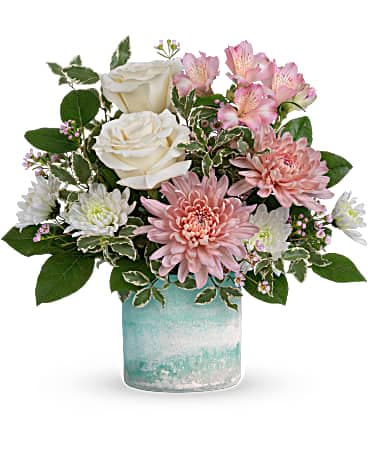 Teleflora's Sweetly You Bouquet - Send your sweetest wishes their way with this charming bouquet of cream and pink blooms, presented in a beautiful art glass vase that's sure to be a dÃ©cor favorite. Creme roses, pink alstroemeria, pink disbud chrysanthemums, white cushion spray chrysanthemums and pink waxflower are arranged with lemon leaf and pitta negra. Delivered in a Color Frost Art Glass cylinder.