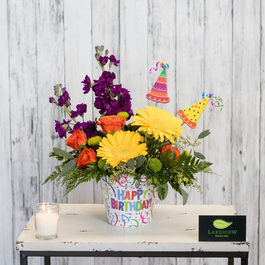 Hooray - Celebrate in style with a colorful arrangement of fragrant stock, vibrant gerbera daisies and long-lasting green mums.  A birthday themed pot and party hat accents add the finishing touch!  Approximate Dimensions: 11&quot; W x 16&quot; H