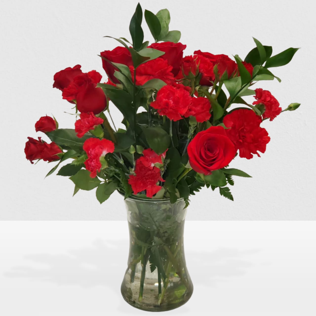 Love with passion by Manny - All red arrangement in a clear vase 