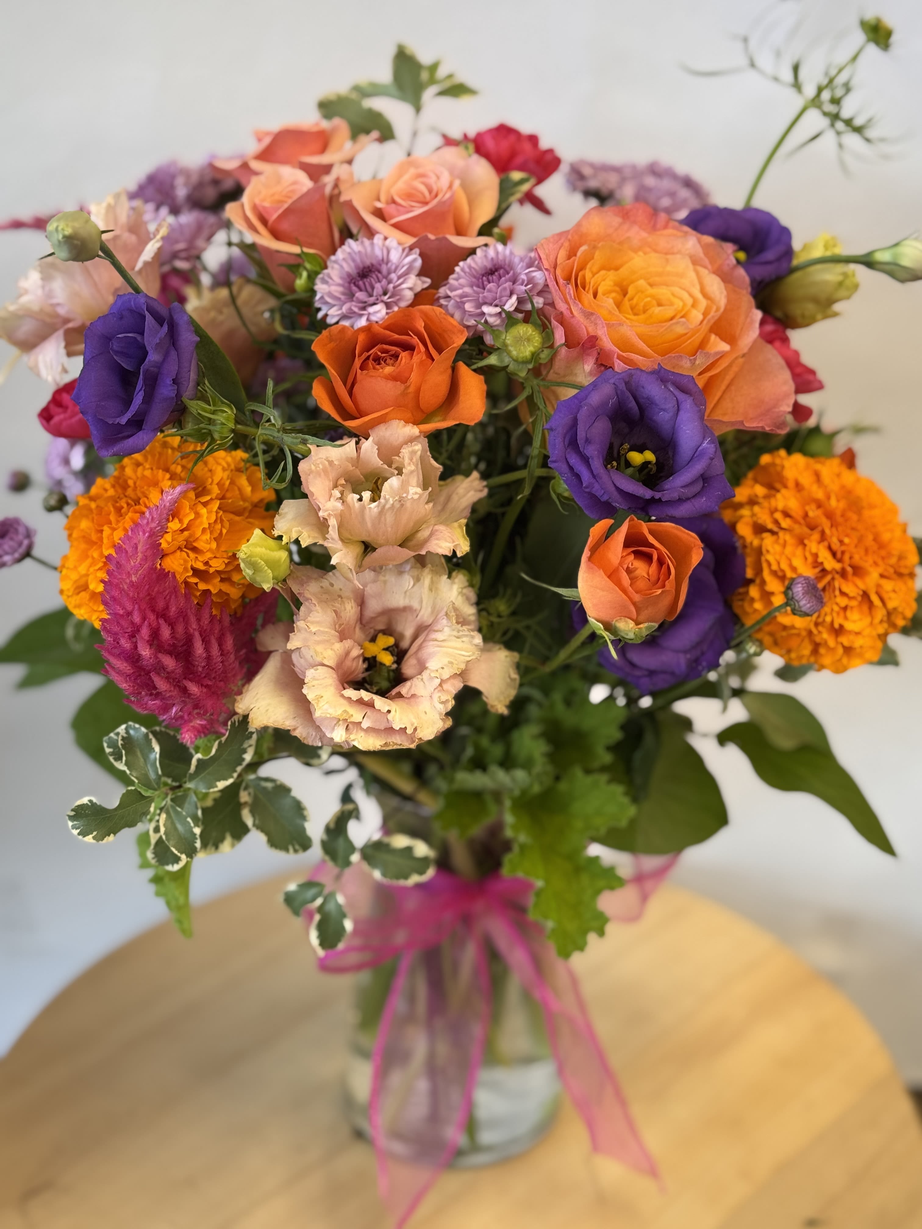 Vibrant burst of colors Vibrant burst of colors - We select the best blooms of the season in a variety of rich and vibrant colors to create this gorgeous bouquet. It will be made as similar as possible to the picture but may contain other types of flowers.