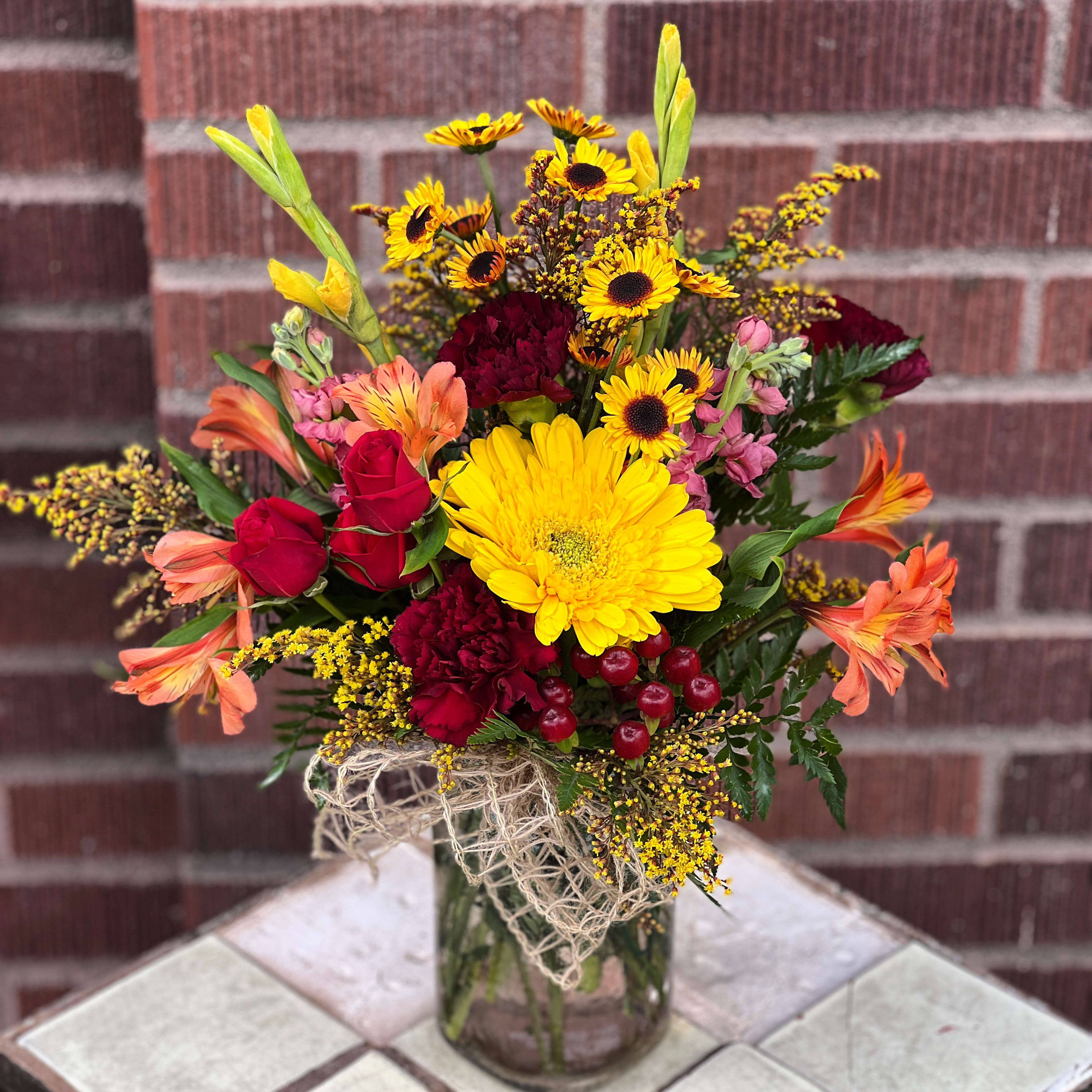 Harvest  - It's fall ya'll! This arrangement arrived in a mason jar style container. :)