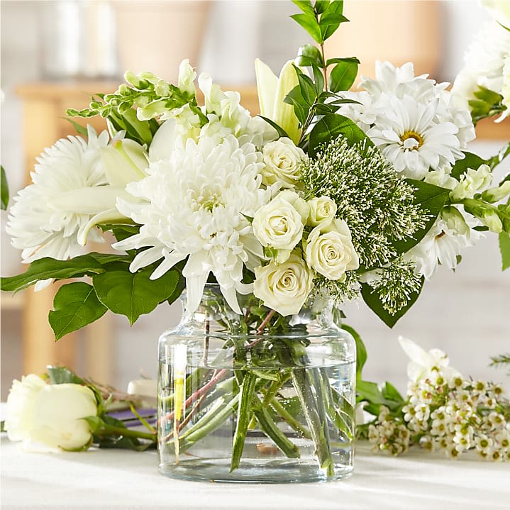 Classic Whites Classic Whites - Classy white blooms in garden style design.