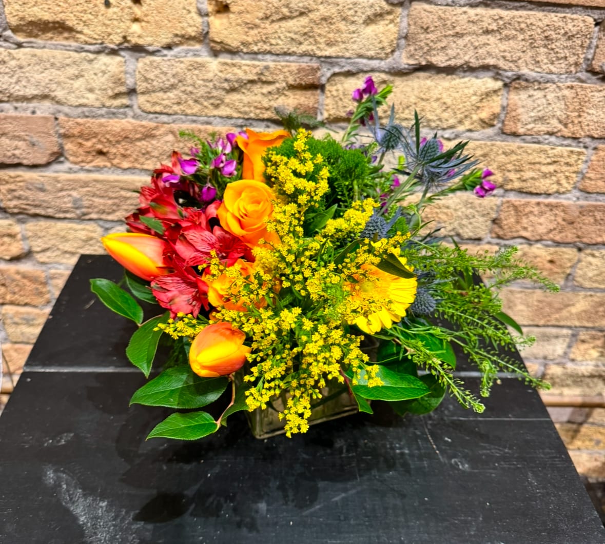 Everybody Loves A Good Rainbow  - Bright &amp; colorful, this arrangement is filled with seasonal flowers of each color of the rainbow.