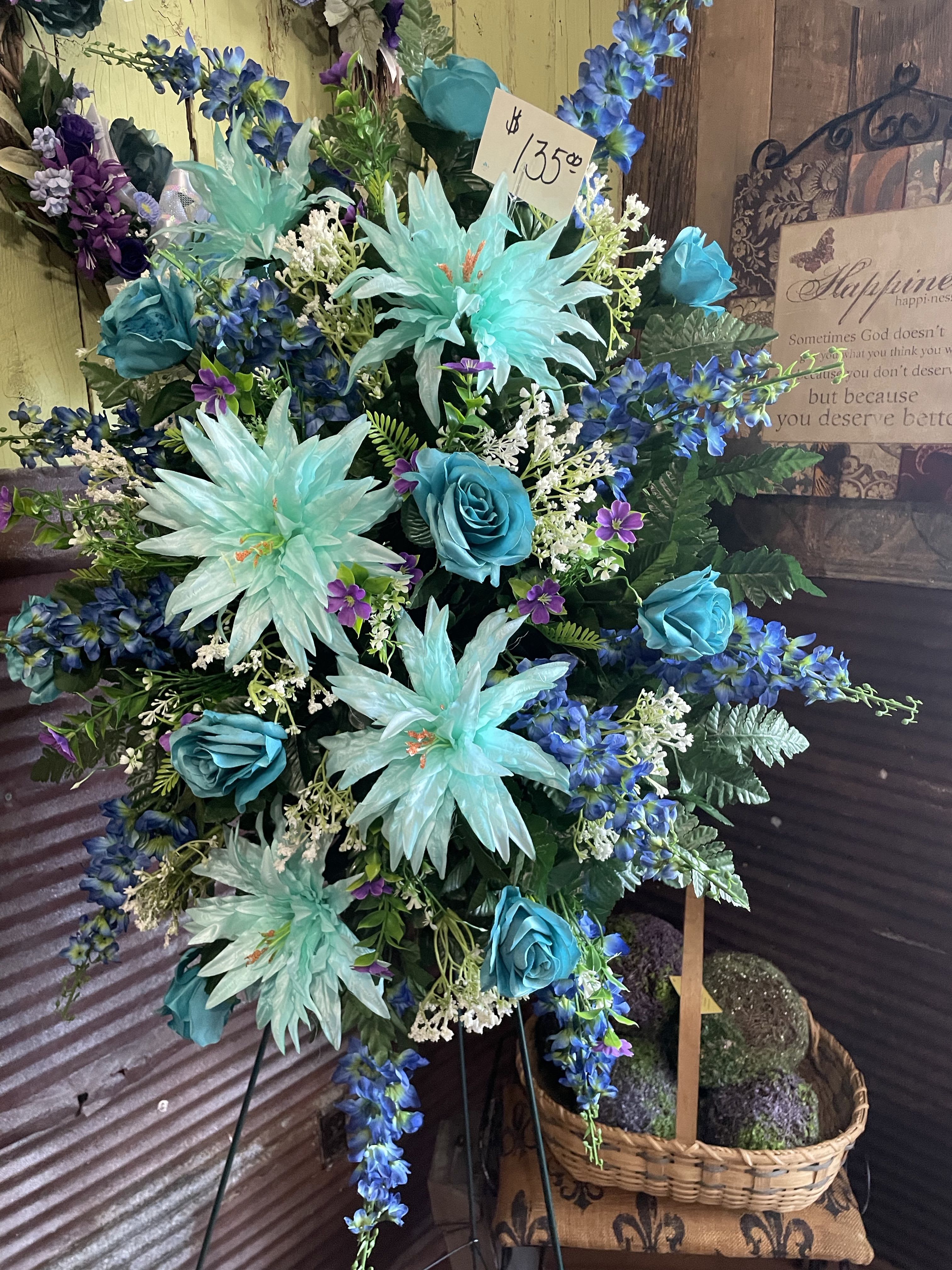 Silk Beauty Stand Silk Beauty Stand - The Floral Silk is a beautiful symbol of someone's life-long faith. A Beautiful mixed floral spray. A grand way to pay tribute to your loved one.