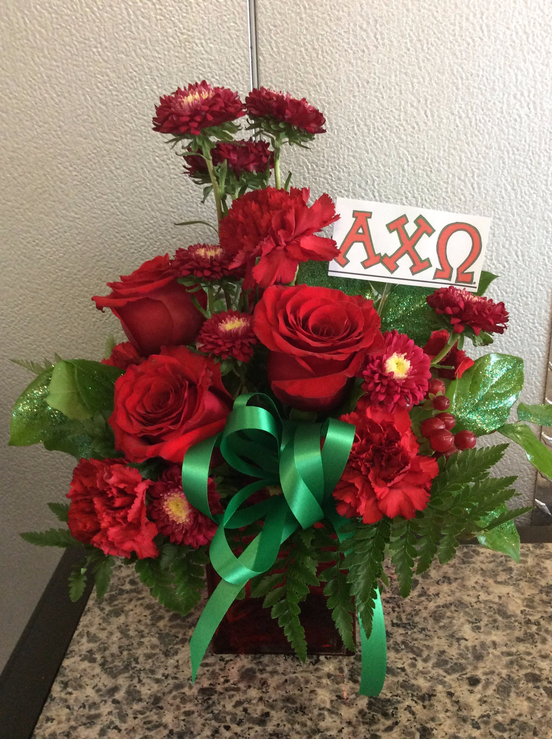 A Chi O Floral - A Chi O themed floral w/ Roses, carnations &amp; asters - Approx. Height 14&quot;
