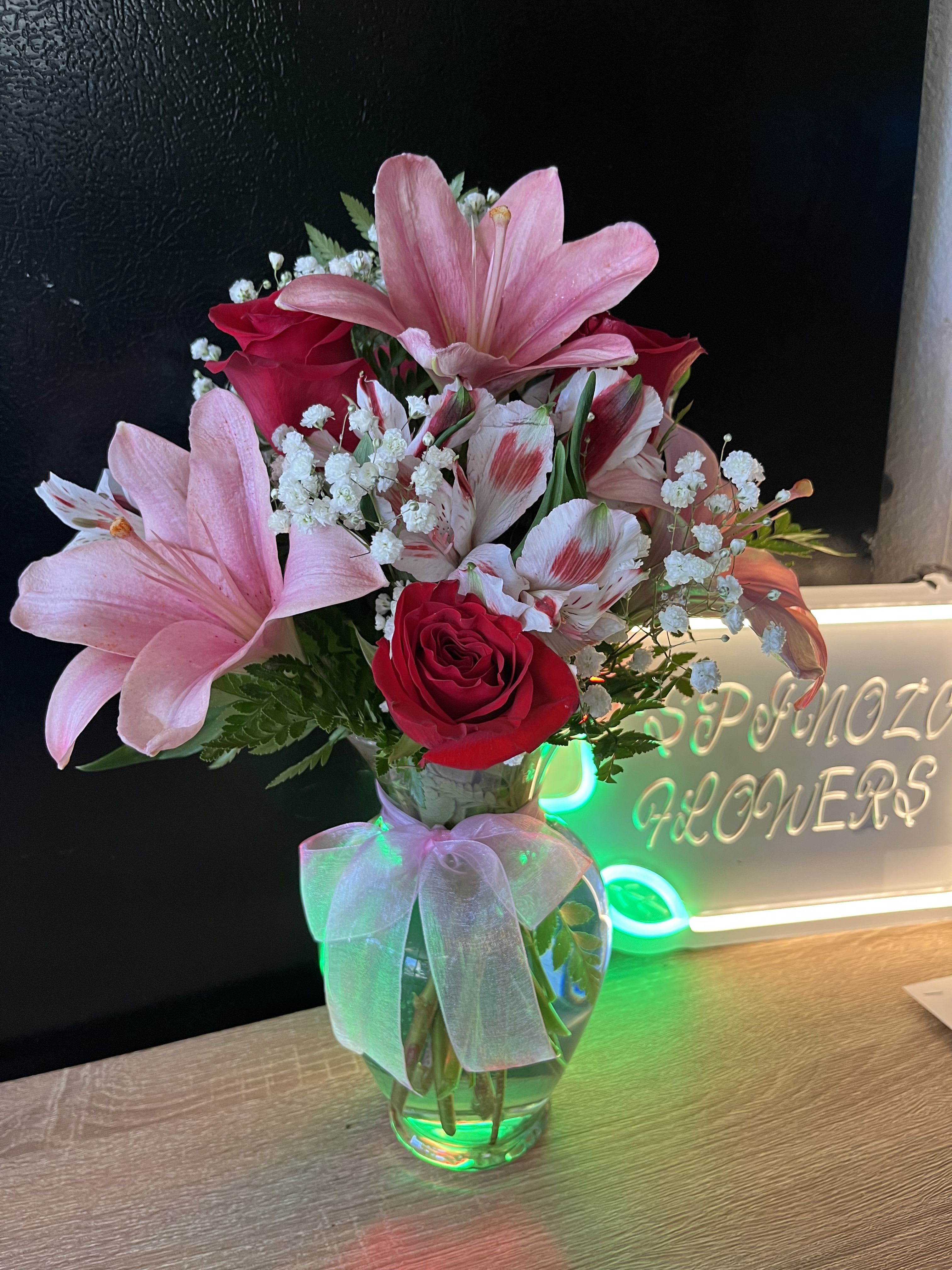 Lily Blossom  - fresh flowers in clear vase 