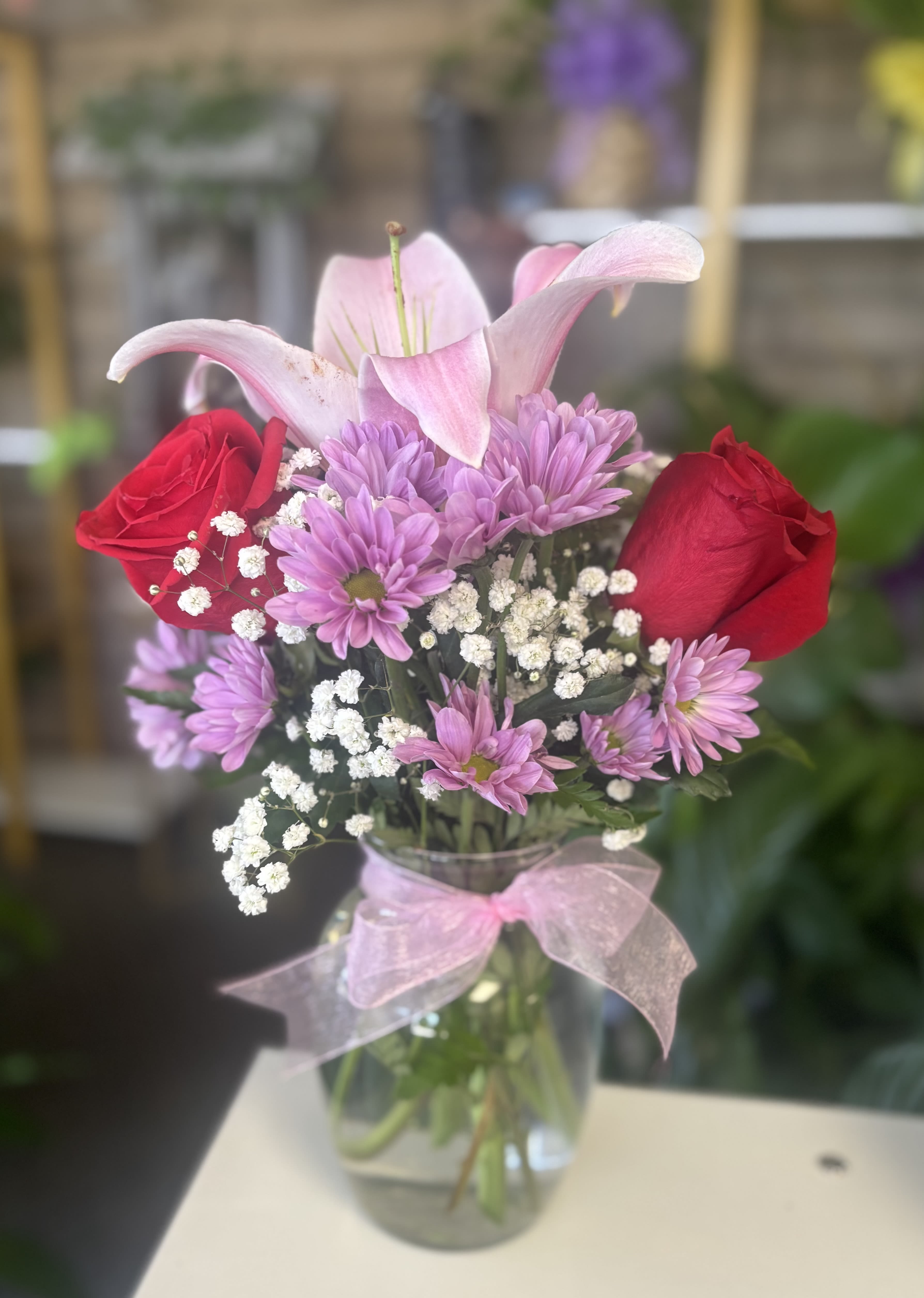 Rose &amp; Lily Celebration  - fresh lilies and roses in clear vase 