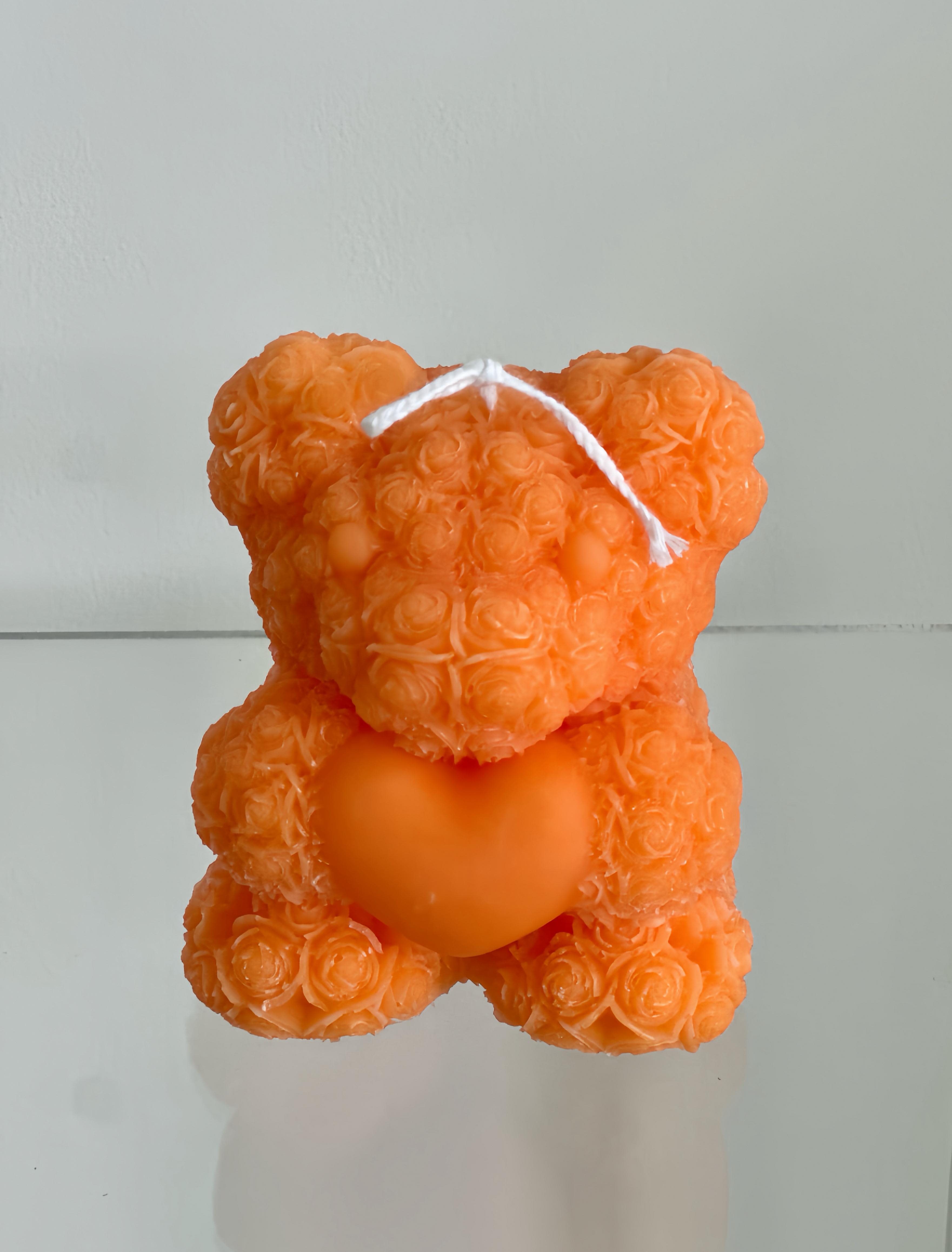Teddy Bear Candle Orange - A handmade teddy bear candle crafted from delicate rose-shaped wax details. Perfect gift for all.  Shades may slightly vary.