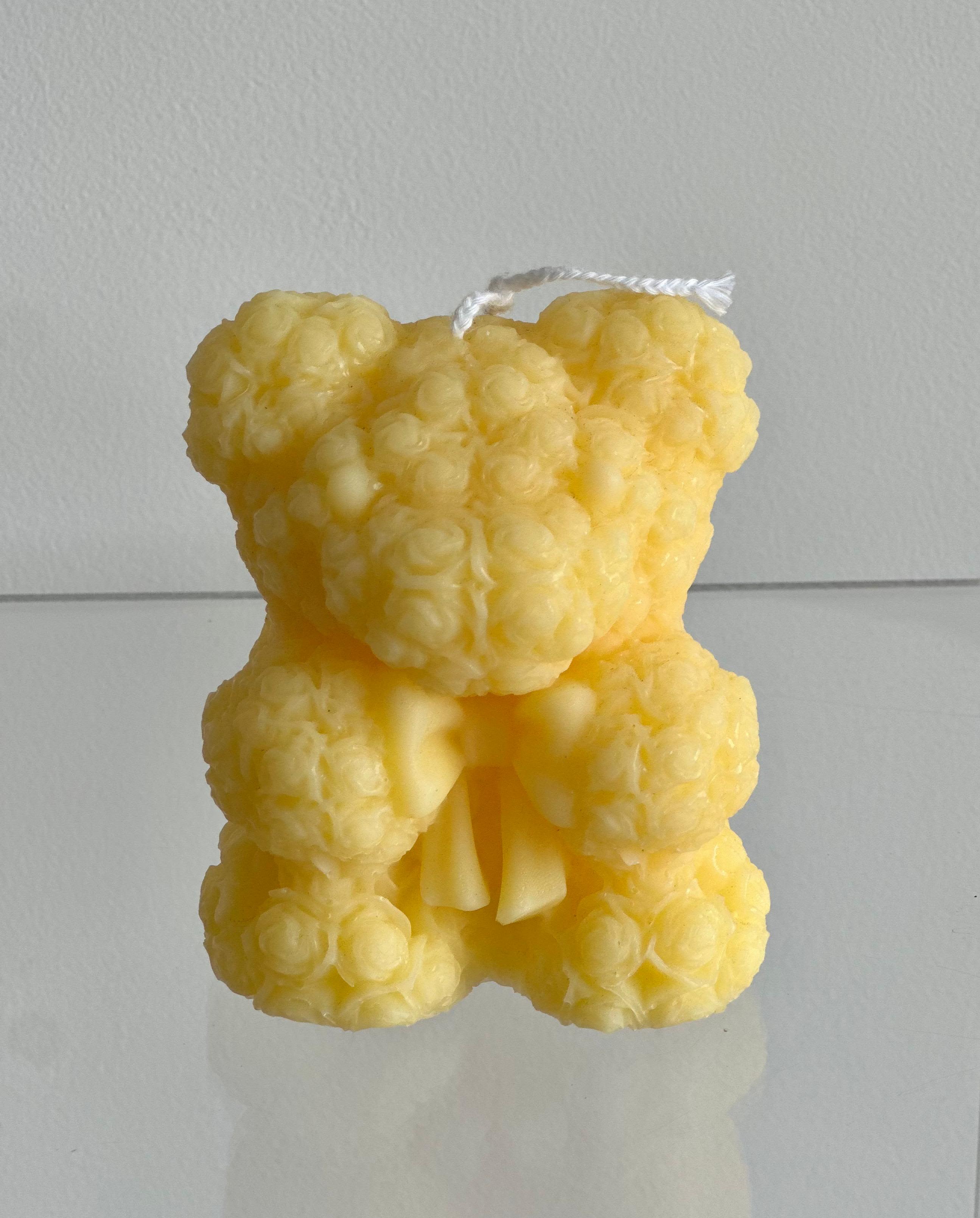 Teddy Bear Candle Yellow - A handmade teddy bear candle crafted from delicate rose-shaped wax details. Perfect gift for all.  Shades may slightly vary.