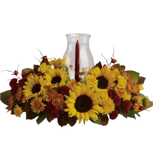 Sunflowers & Centerpiece Sunflowers & Centerpiece - Beautiful centerpiece, Sunflowers Orange Roses, Daisy Harley Medium Bronze, Daysi Rosalina Red-Bronze, red candle and beautiful seasonal foliage. The pictures are referential.Measurements: H 6 x W 18 Inches approximat