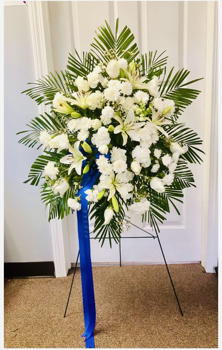 Standing Spray - SYMPATHY White and Blue - White Lilies, Roses, Chrysanthemums, Carnations, Snapdragons, Limonium, Palms, Leather Leaf, Blue Ribbon, and Easel 42” H 