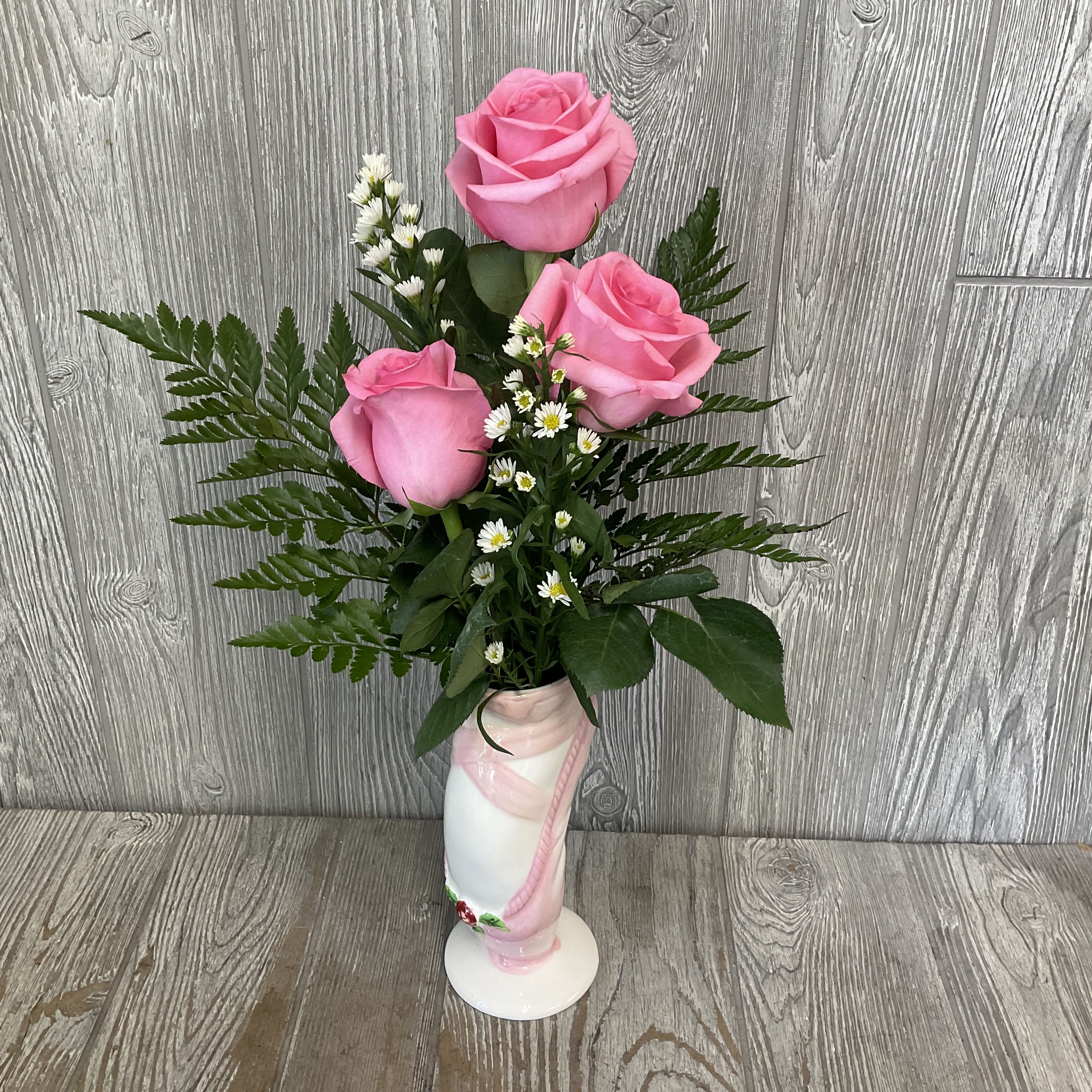 On Pointe  - A cute pink and white floral arrangement inside of a ceramic ballet pointe shoe!