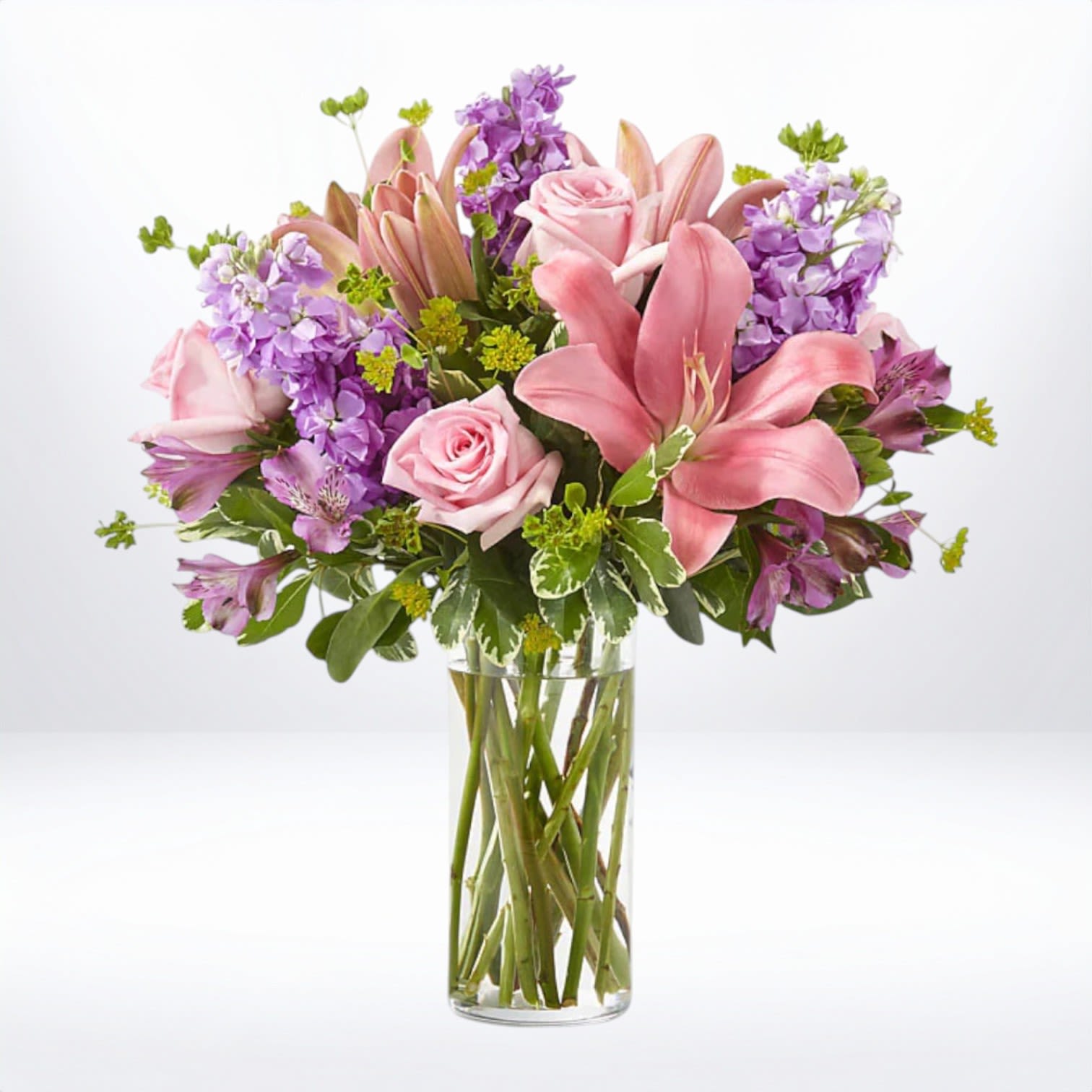 Precious Petals Bouquet Precious Petals Bouquet - Indulge in the beauty of spring with the Precious Petals Bouquet. Let its exquisite blooms and enchanting fragrance create a memorable and uplifting gift for yourself or someone special. Please Note: The bouquet pictured reflects our original design for this product. While we always try to follow the color palette, we may replace stems to deliver the freshest bouquet possible, and we may sometimes need to use a different vase.