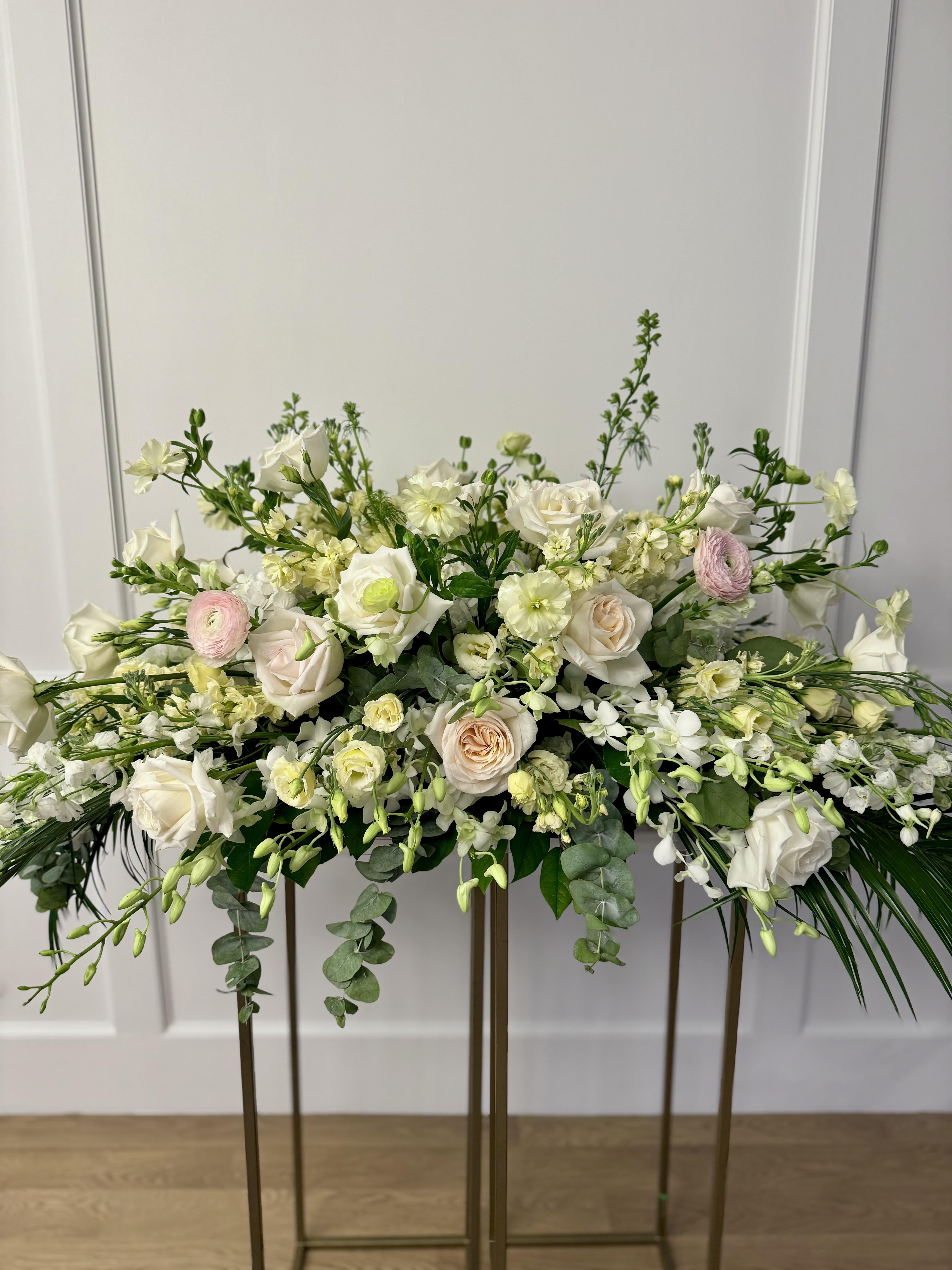 Casket Spray - A large casket spray made with premium flower selections in a neutral color palette. 