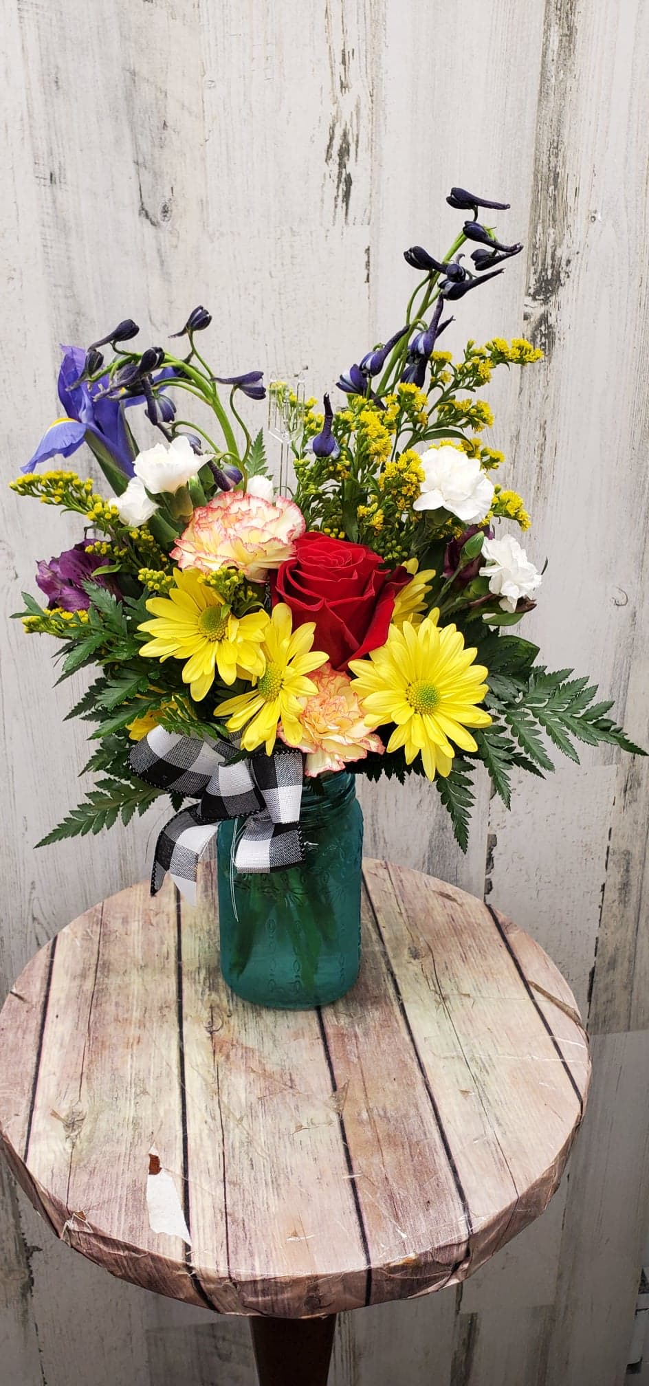 Homesick -  A quaint mason jar with flowers to remind you of home.