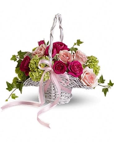 Flower Girl's Dream Basket - This perfect little basket of pink blooms and fresh greens is trimmed with pink organza ribbon. A small princess basket overflows with roses, viburnum, green chrysanthemums and ivy.