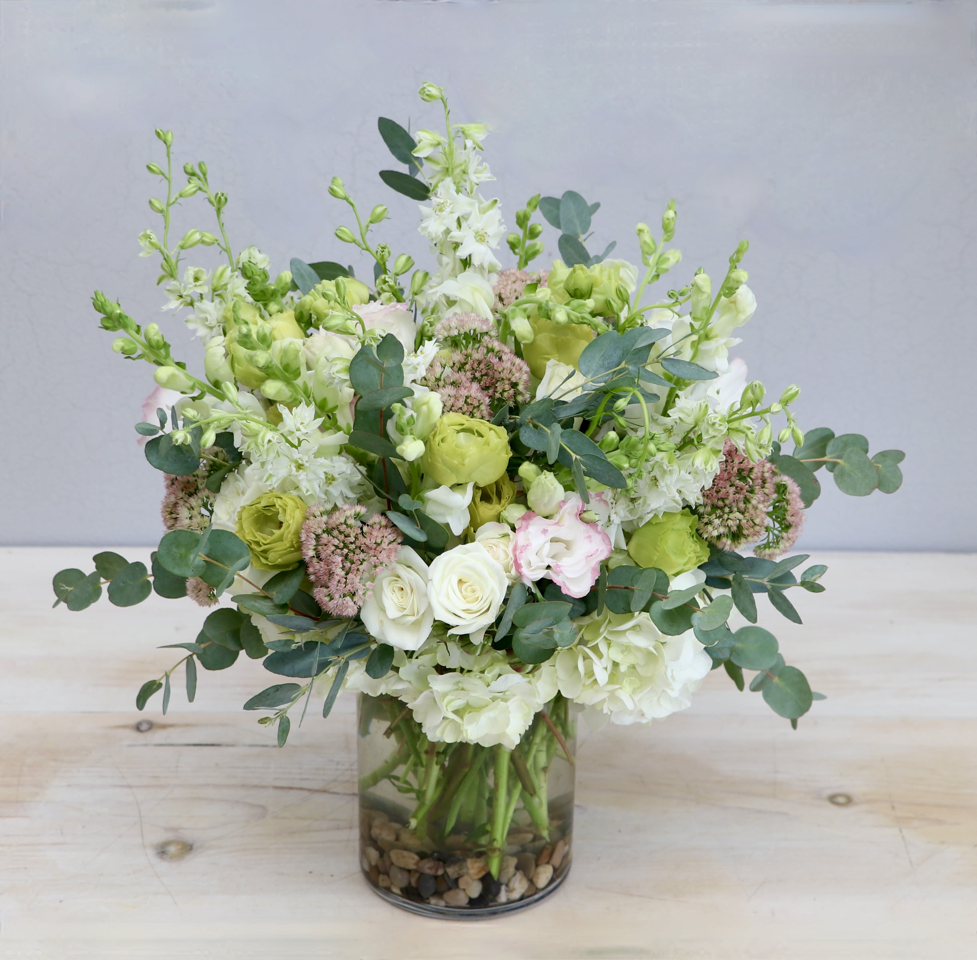 Pink Limeade - My Glendale Florist Pink Limeade - My Glendale Florist - Green, white, and soft pink florals come together to create this flowy arrangement. The standard size stands about 10-12 inches tall.