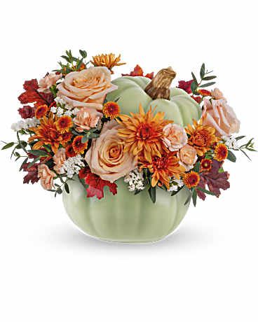 Fall Sage Pumpkin - This elegant bouquet features peach roses, carnations, bronze chrysanthemums, and eucalyptus. It comes in a pumpkin-shaped vase and is perfect for adding a fall touch to your home.