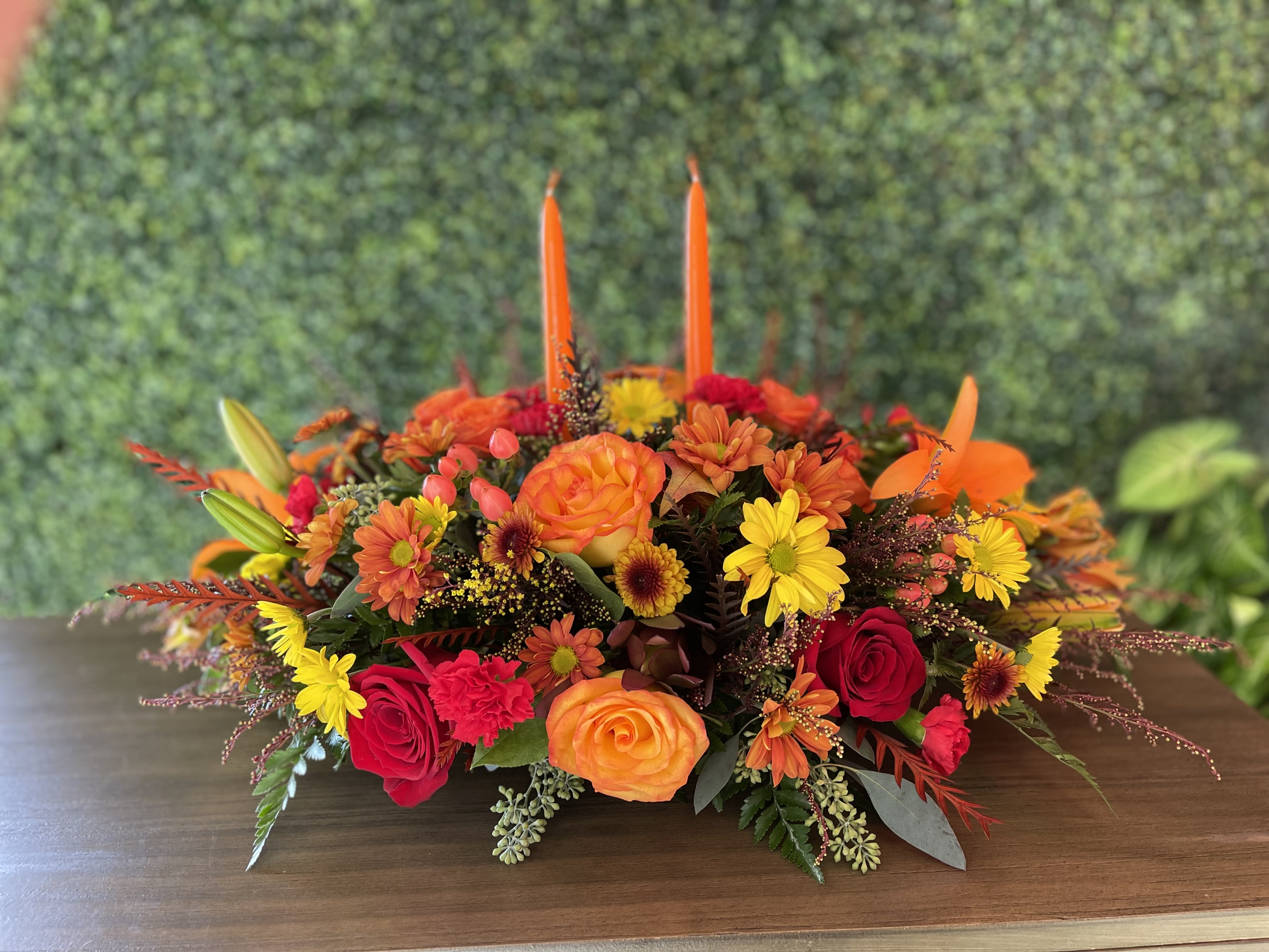 Thanksgiving centerpiece Thanksgiving centerpiece - Beautiful Centerpiece ready to decorate your beautiful table for a lovely thanksgiving celebration. Gorgeous mix of autumn flowers with all the bronze, orange, and red colors.