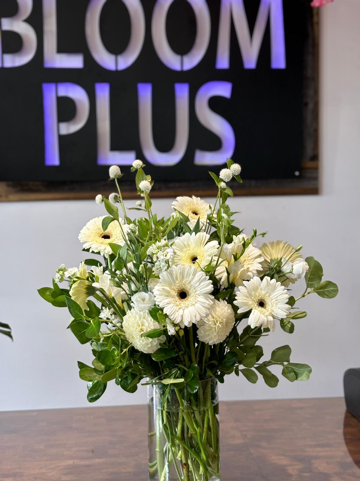 Fall 4 Fall 4 - This arrangement features white gerbera daisies, dahlias, and seasonal blooms paired with lush greenery. *Depends on availability, flowers may change