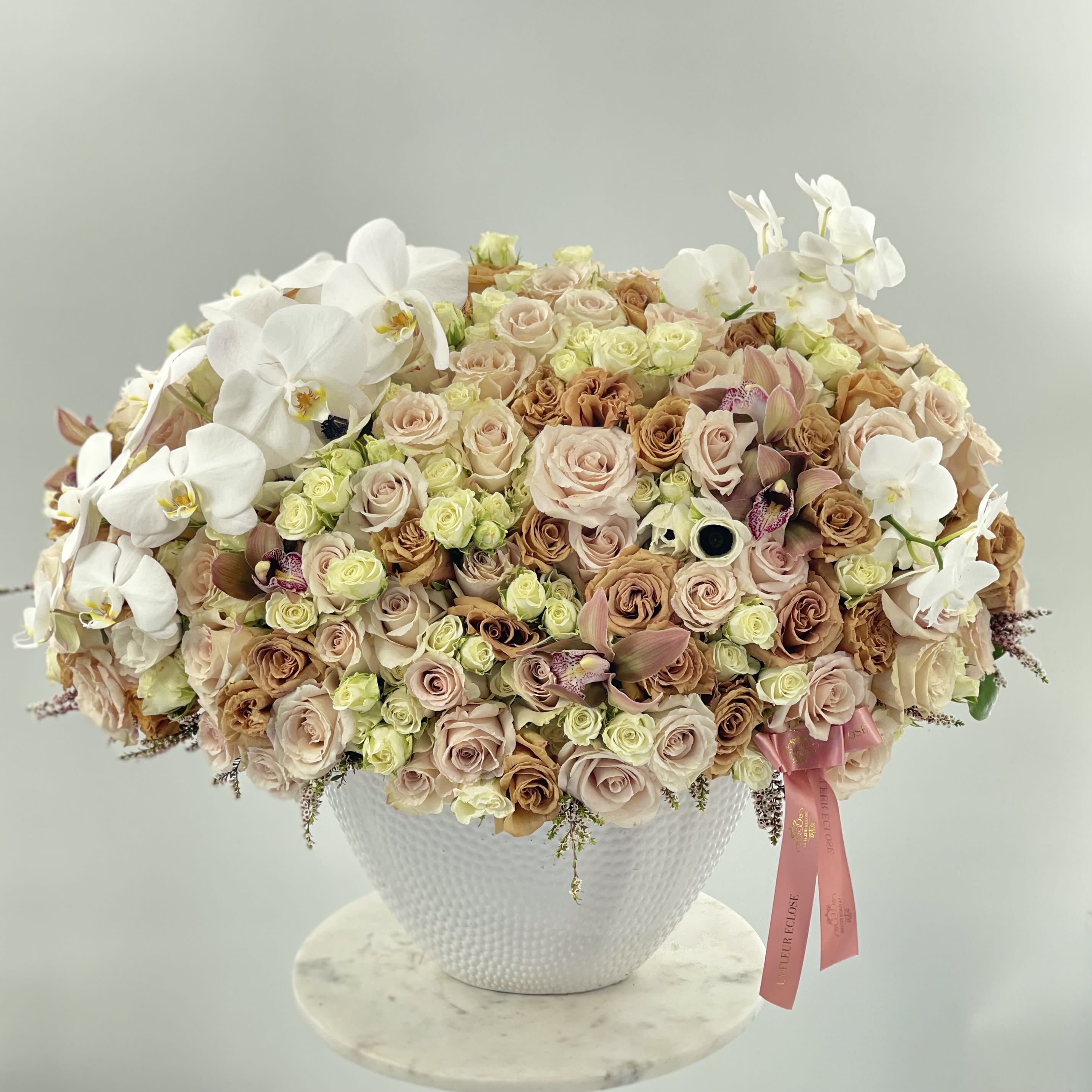 Breathtaking Vase - Luxurious mixed flowers with roses, spray roses, orchids and many more in our large vase.