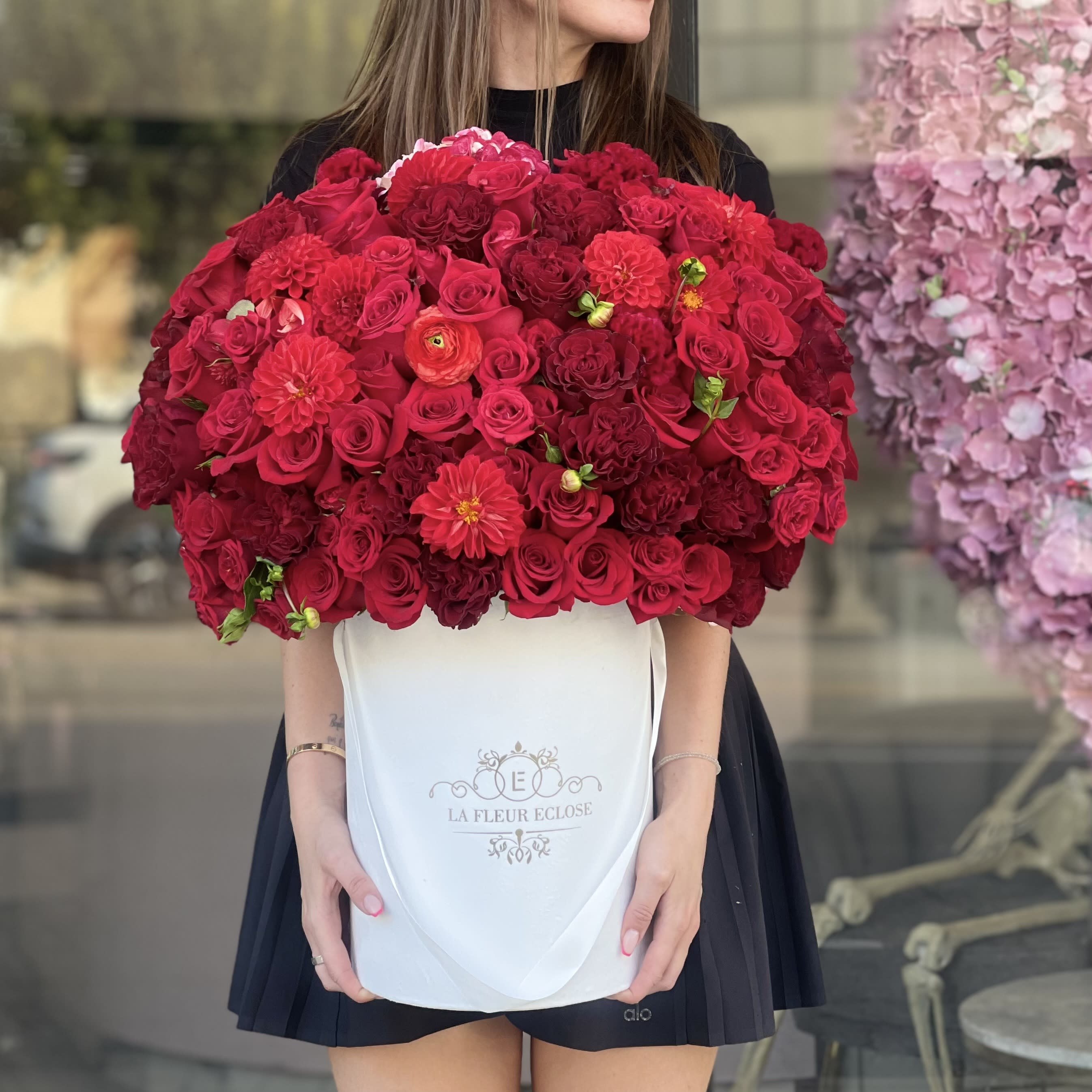 Red Mary - Red roses and an array of beautiful flower mixtures. Made as pictured.