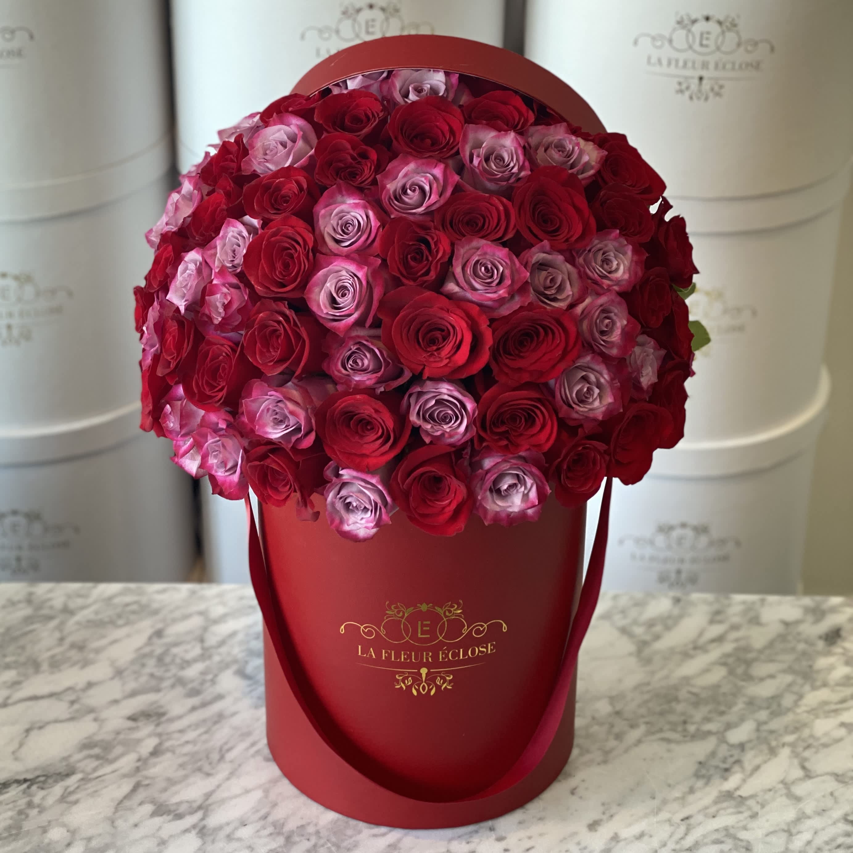 Purple in Red V  - deep purple roses in red velvet box will be a great choice for anyone who wants to make the love ones fill your love 