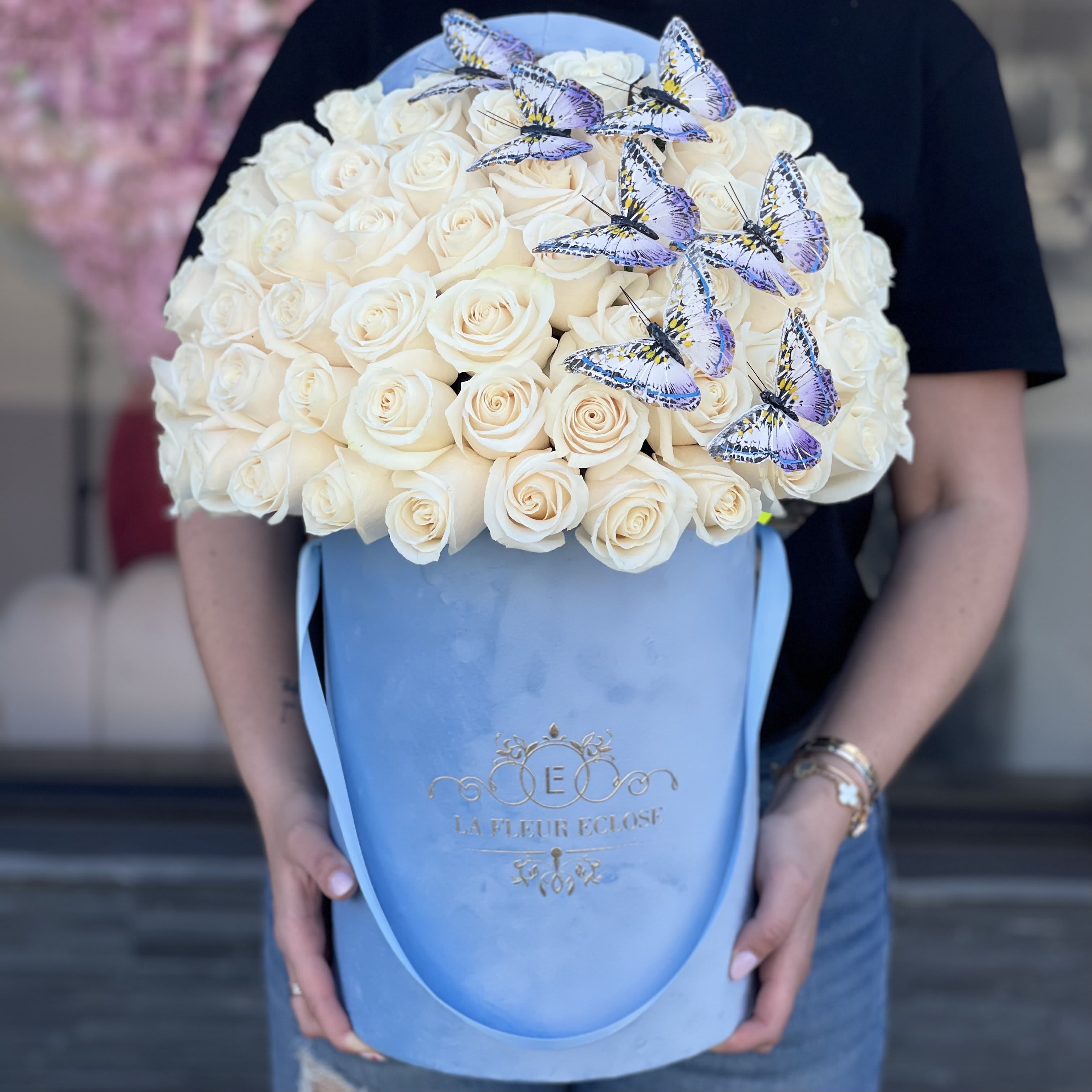 Blue With Butterflies  - 50 white roses with butterflies in our signature velvet box. 75 white roses with butterflies in our signature velvet box.