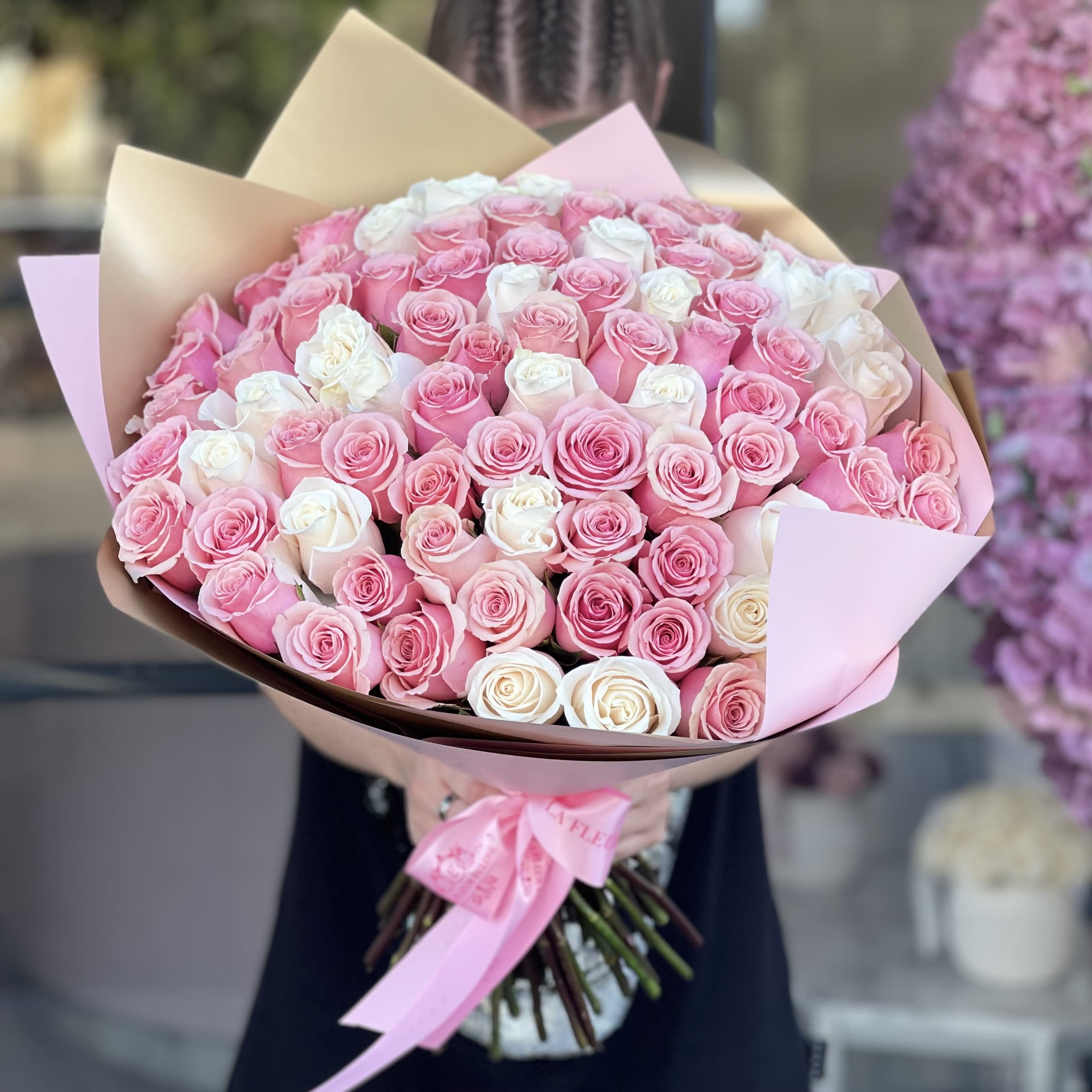 Marshmallow bouquet  - Standard - 75 white and pink roses (pictured) Deluxe- 100 roses  Premium- 150 roses