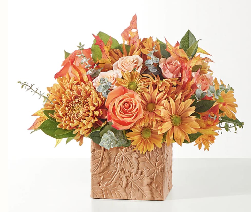 Scenic Route Bouquet - Reminiscent of taking a long drive upstate, this beautiful bouquet of orange, peach and bronze florals in a seasonal vase is a sweet way to share your sentiments with a loved one near or far.