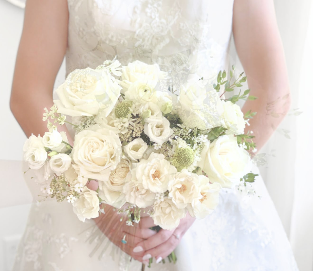 Traditional Wedding Bouquet - Elegant Whites & Creams Traditional Wedding Bouquet - Elegant Whites & Creams - A classic wedding bouquet designed with gorgeous creams and white blooms. This bouquet is hand tied and finished with romantic chiffon ribbon in a coordinating color. A super pretty option for a bridal bouquet, or a luxe option for a bridesmaid or maid of honor.