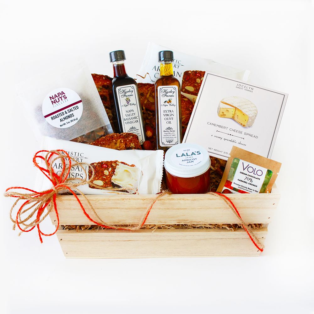 Gourmet Grazing Gift Crate Gourmet Grazing Gift Crate - Expertly crafted with a delicious blend of Olive Oil and Balsamic Vinegar, Artisan Crisps, Almonds, Lala's Jam, Mini Chocolate Bar, and Fresh Cheese. Gourmet Grazing offers a delectable grazing experience. Savor the perfect balance of flavor and texture in every bite. Contents: 2fl oz Olive Oil and Balsamic Vinegar, .7oz Artisan Crisps. 3oz Almonds. 2oz Lala's Jam. 1oz Mini Chocolate Bar, 6oz Fresh Cheese