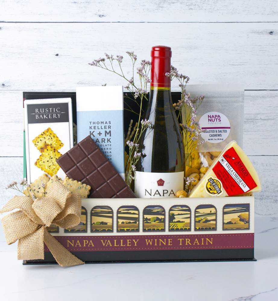 Welcome to Napa Valley Wine Train Gift Box Welcome to Napa Valley Wine Train Gift Box - All aboard the Napa Wine Train Gift Box, a journey through the heart of Napa Valley’s finest flavors. This elegant gift set brings together a selection of Napa wine, gourmet cheese and crackers, savory Napa nuts, and decadent chocolate, all beautifully packaged to deliver a taste of luxury and sophistication.of the Valley. Contents: Retrieving data. Wait a few seconds and try to cut or copy again.