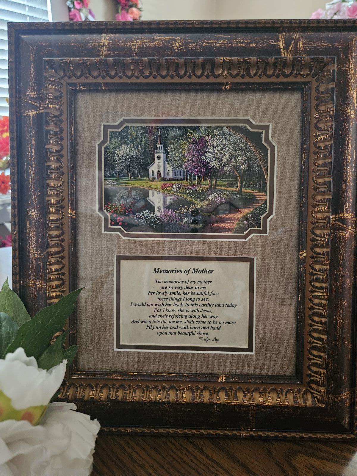 A Mother’s Memory Picture  - A beautiful frame encompasses Memories of Mother- A thoughtful sentiment during the loss of a beloved parent. Ribbon will be added.  May differ depending on stock. Please call or note in special instructions if you have a preference.