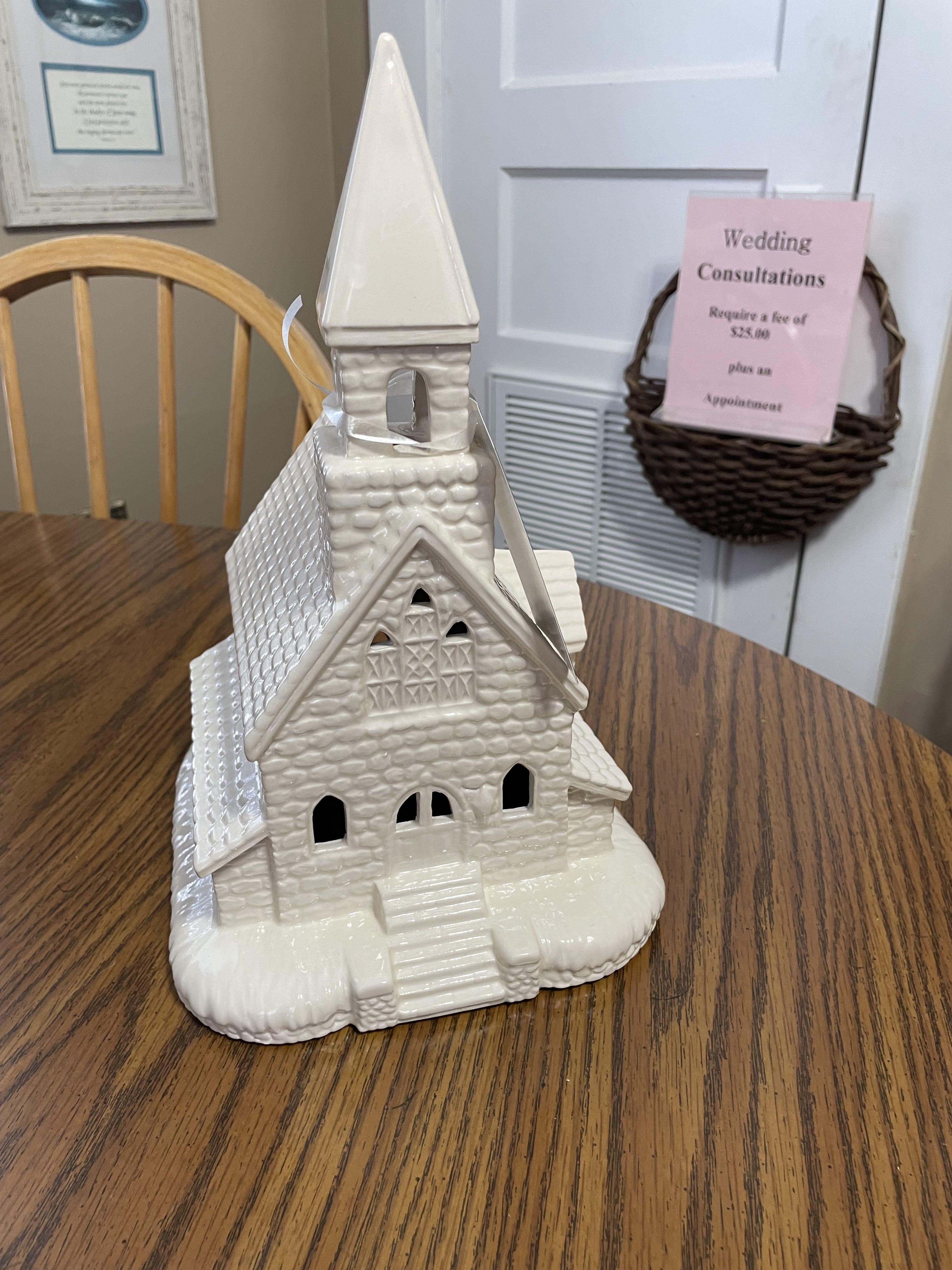 Elegant Country Church Elegant Country Church - We love these handmade in Shelbyville Tennessee, ceramic churches. This church is a beautiful rendition of a country church with steeple. Lighted . Glazed. A lovely gift to send in memory of a loved one.