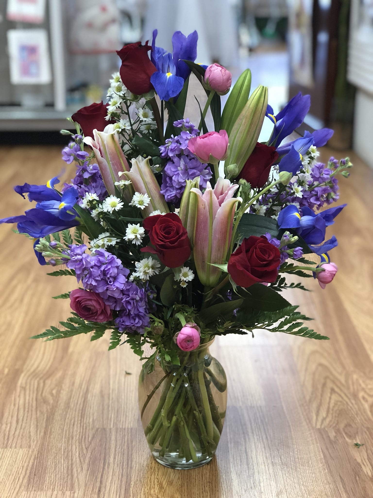 DESIGNED FOR YOU BOUQUET DESIGNED FOR YOU BOUQUET - Purple iris ,lavender stock,red rosas,white Mintecasino,leather lives