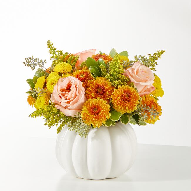 Peachy Pumpkin - Soft muted fall tones inside one of our keepsake white ceramic pumpkins