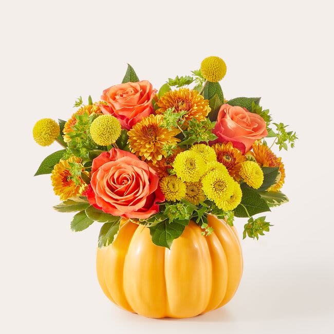 Gourdgeous Pumpkin - This fun fall festive floral mix arrives in a keepsake orange ceramic Pumpkin