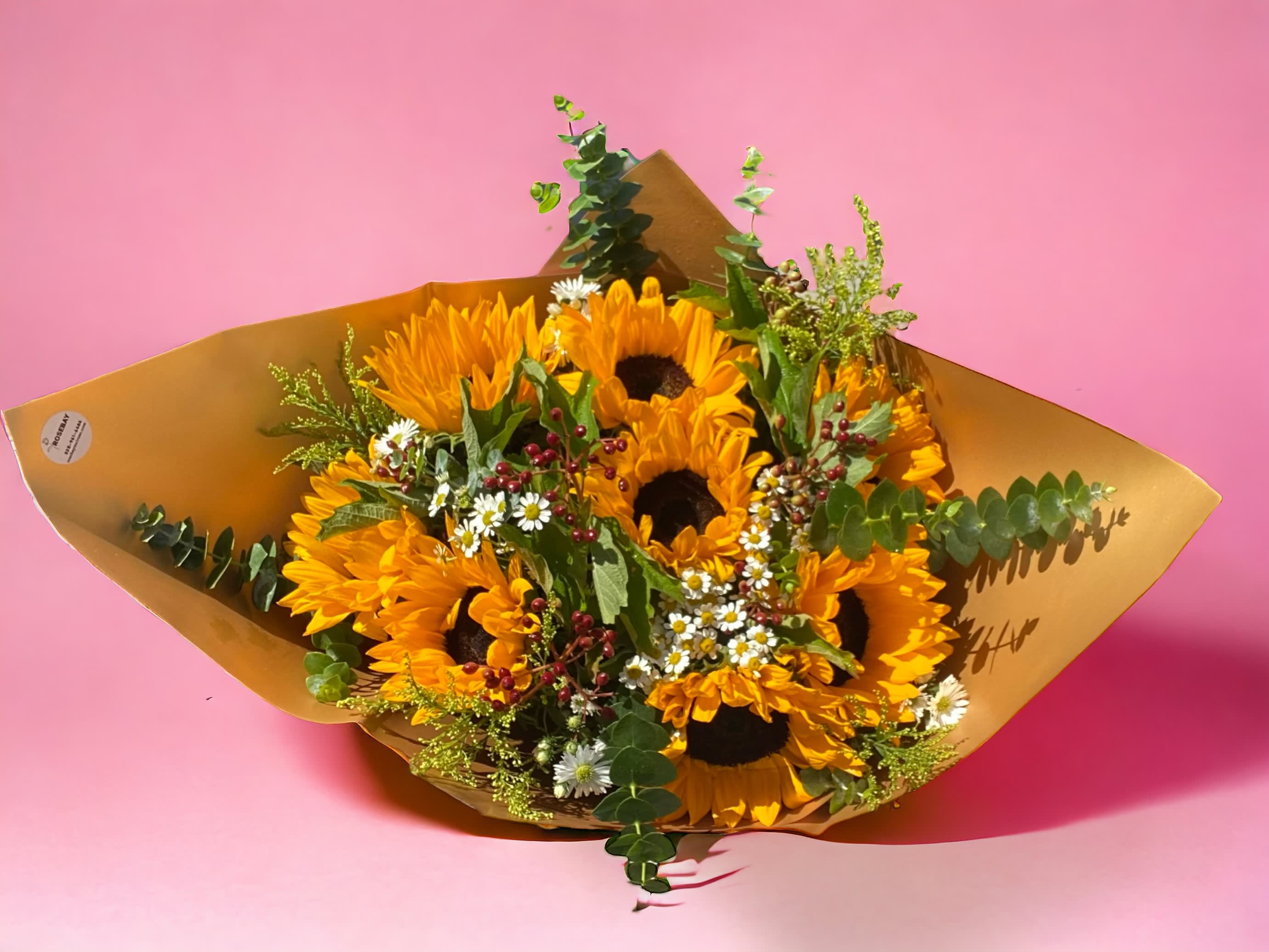 Sunflowers bouquet - A bouquet of 8 long stem sunflowers and other flowers for any occasions. Deluxe is 10 long stem sunflowers. Premium is 12 long stem sunflowers. **Wrapping style and designs may vary** We offer different colors and styles for wrapping paper. Please note in Florist Instructions your choice of wrapping paper. We have one solid color like red, pink, white, classic brown, clear, etc. We also have two side colors like white/gold, light pink/hot pink, pink/purple, blue/white etc. And lastly, we have them in shiny/iridescent colors, or texture/style paper. Call us at 323-961-6686 if you have any questions.