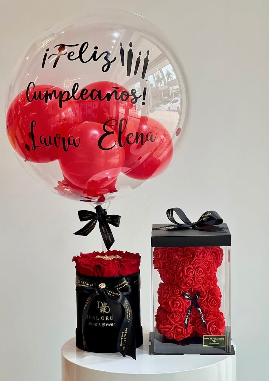 Personalized gift set - medium red Personalized gift set - medium red - Gift set including Rose Bear 10" tall in a box, arrangement of long-lasting natural roses in a velvet gift box, and bubble balloon with personalized message. Please specify in special instructions what message would you like to include on the balloon (up to 6 words).
