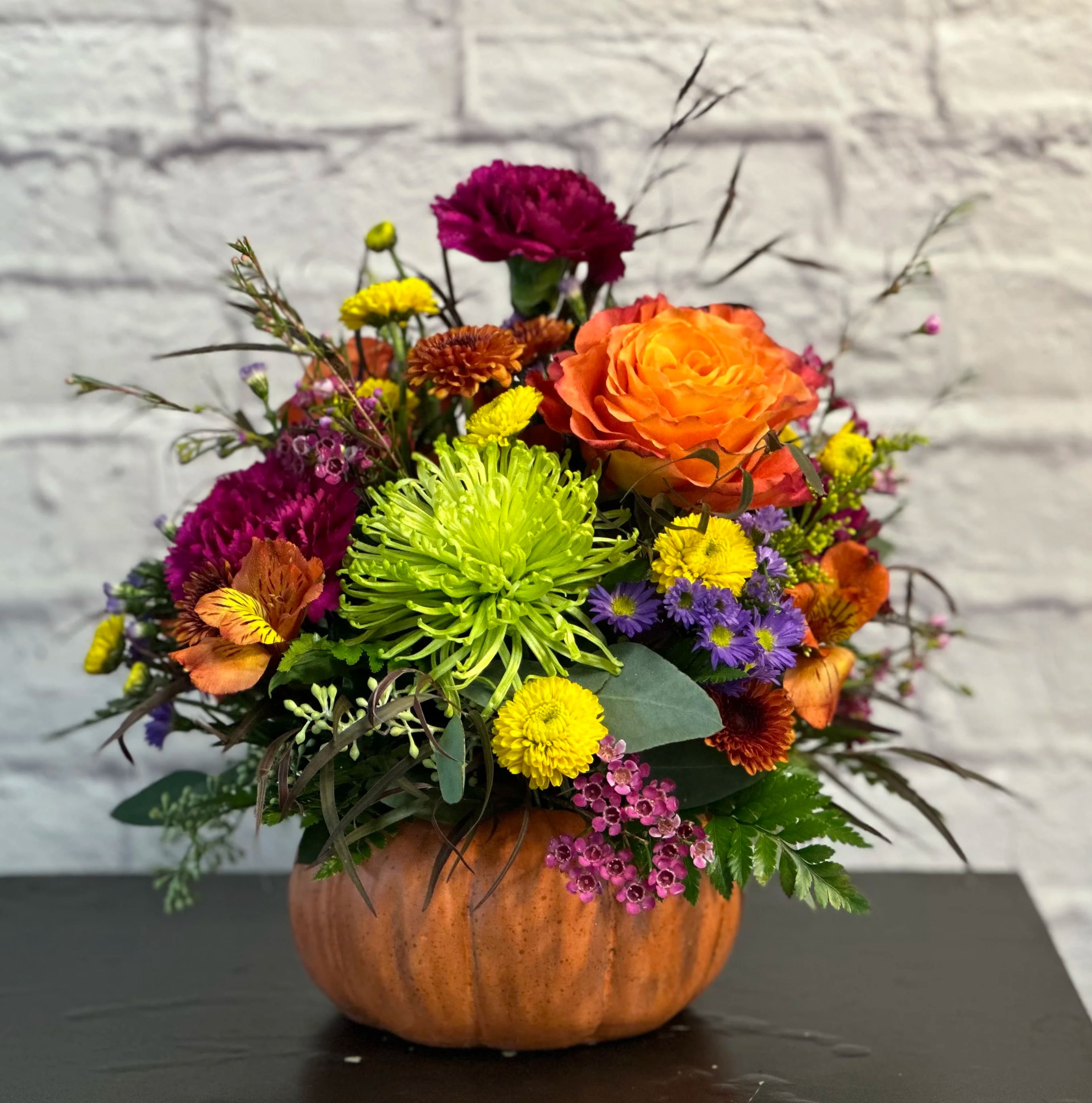 Harvest Pumpkin - Send this charming arrangement designed in a ceramic pumpkin to make anyone's fall day a little brighter!