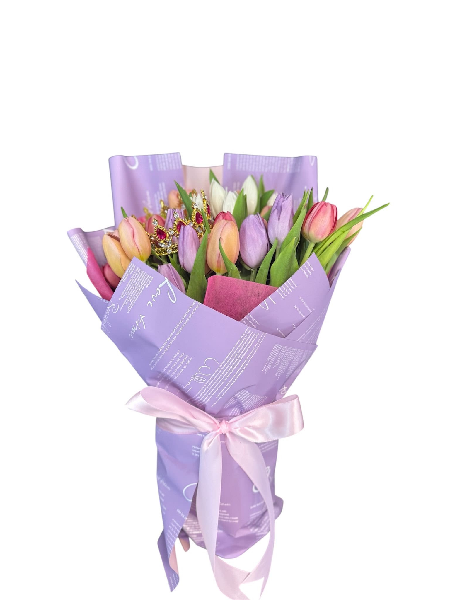 Tulip Bouquet Tulip Bouquet - A tulip bouquet elegantly wrapped in paper, showcasing vibrant colors and delicate shapes that convey joy, purity, and natural charm in every stem.
