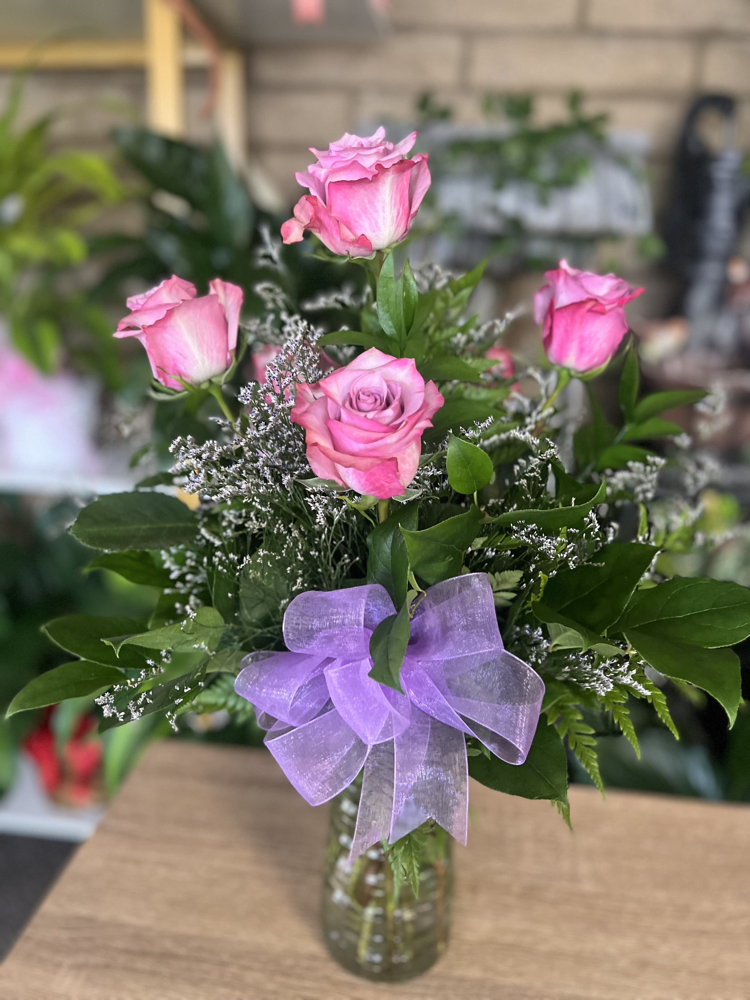 Unique Pink  - Fresh six pink roses in vase with greenery and baby breath 