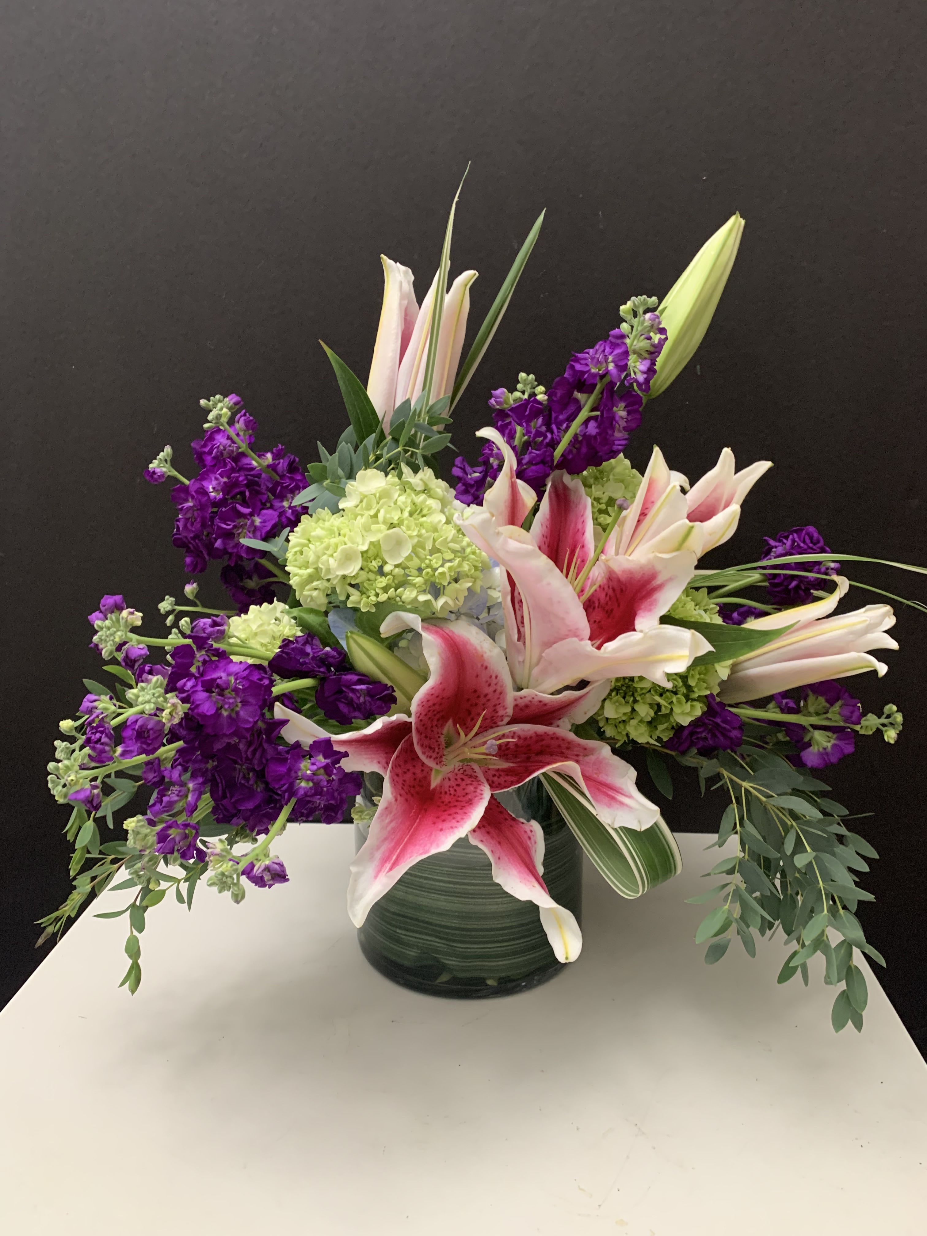 Garden Look Garden Look - Lilies, Stock, Hydrangeas, green in 6”x6”cylinder glass vase