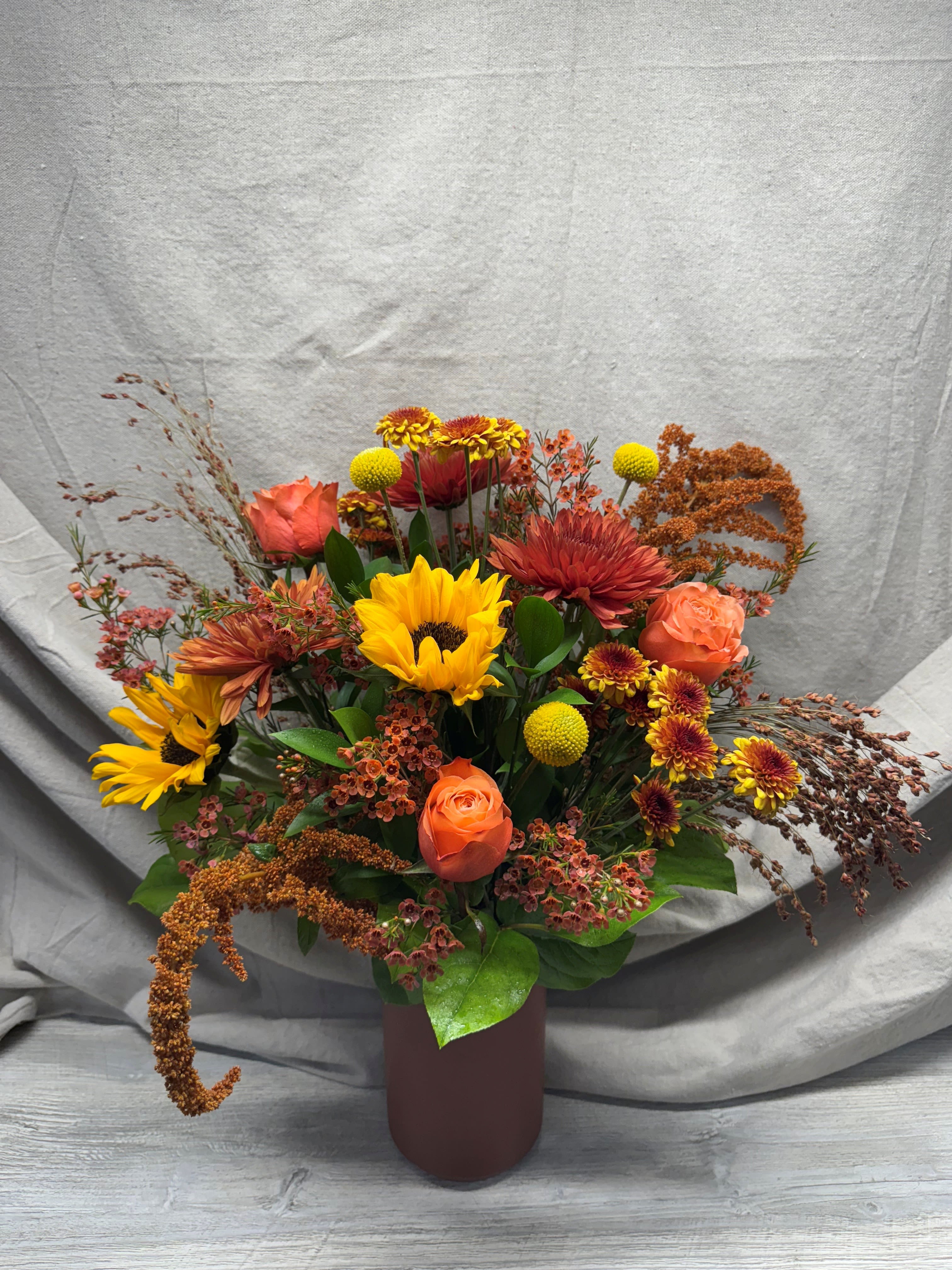 Rustic Harvest - Bring the charm of the countryside into your space with this rustic fall bouquet, overflowing with the earthy tones and textures of the season.